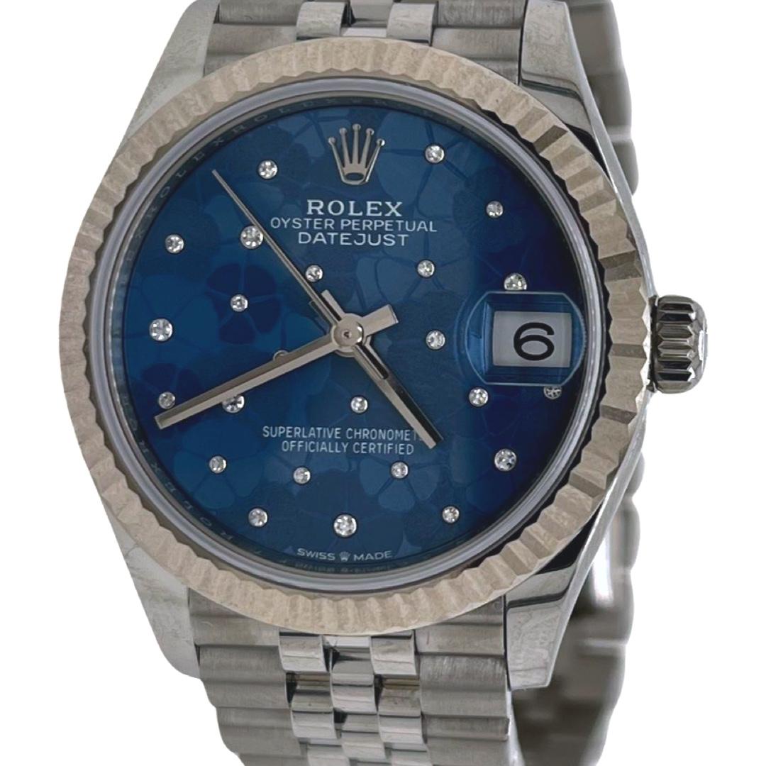 Brand: Rolex 

Model Name: Datejust

Model Number: 278274

Movement: Mechanical Automatic

Case Size: 31 mm

Case Material: Stainless Steel

Bracelet: Jubillee, fully linked 

Dial: Floral Pattern with diamonds

Bezel: Fluted, 18k White Gold

Links: