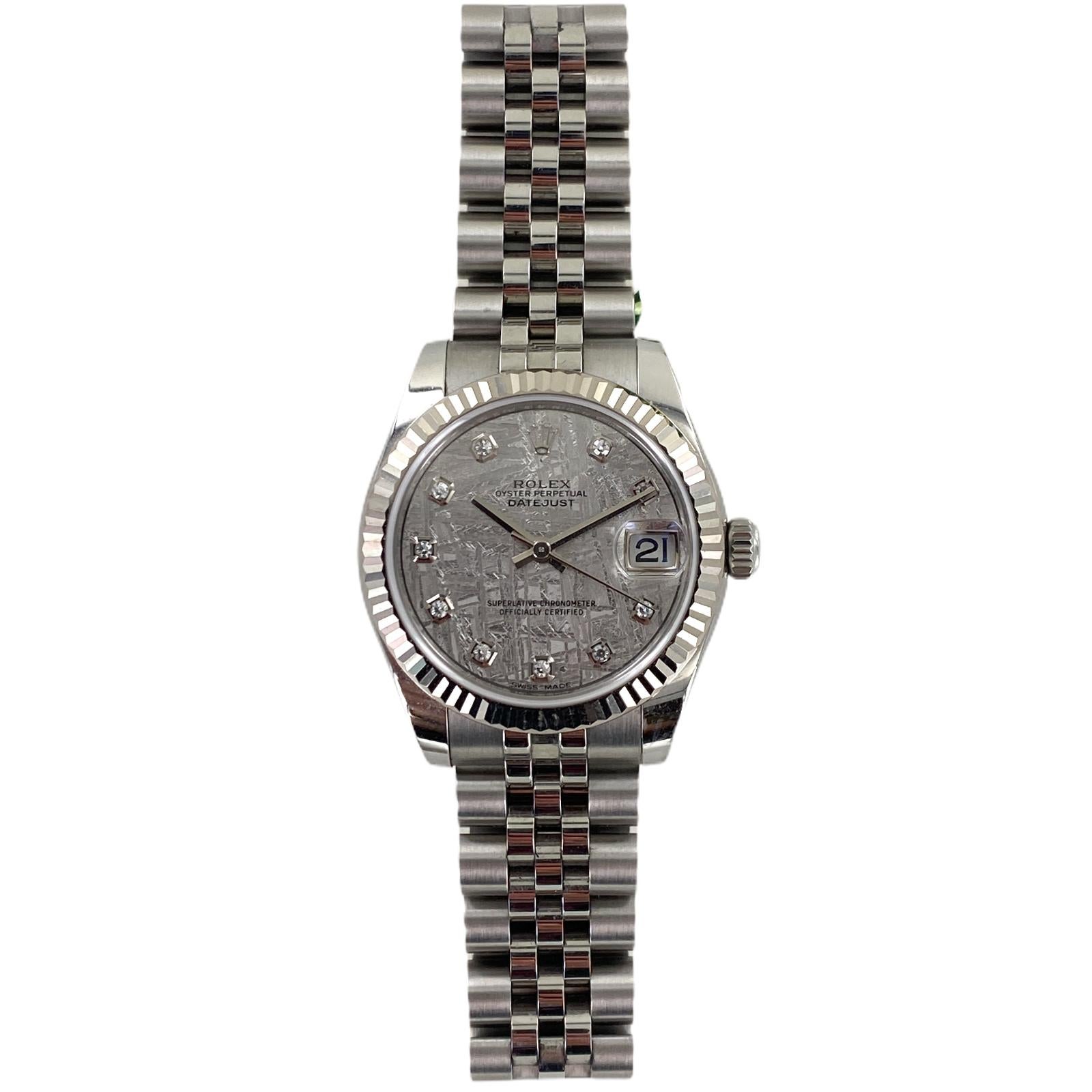 Oyster Perpetual Rolex Datejust 31mm. The watch is circa 2018, features sapphire crystal, white gold fluted bezel, Jubilee bracelet, and Meteorite 10 diamond dial.  Reference #: M178274-0016-63160  Serial # 47L....  ,  Box and Papers-Excellent