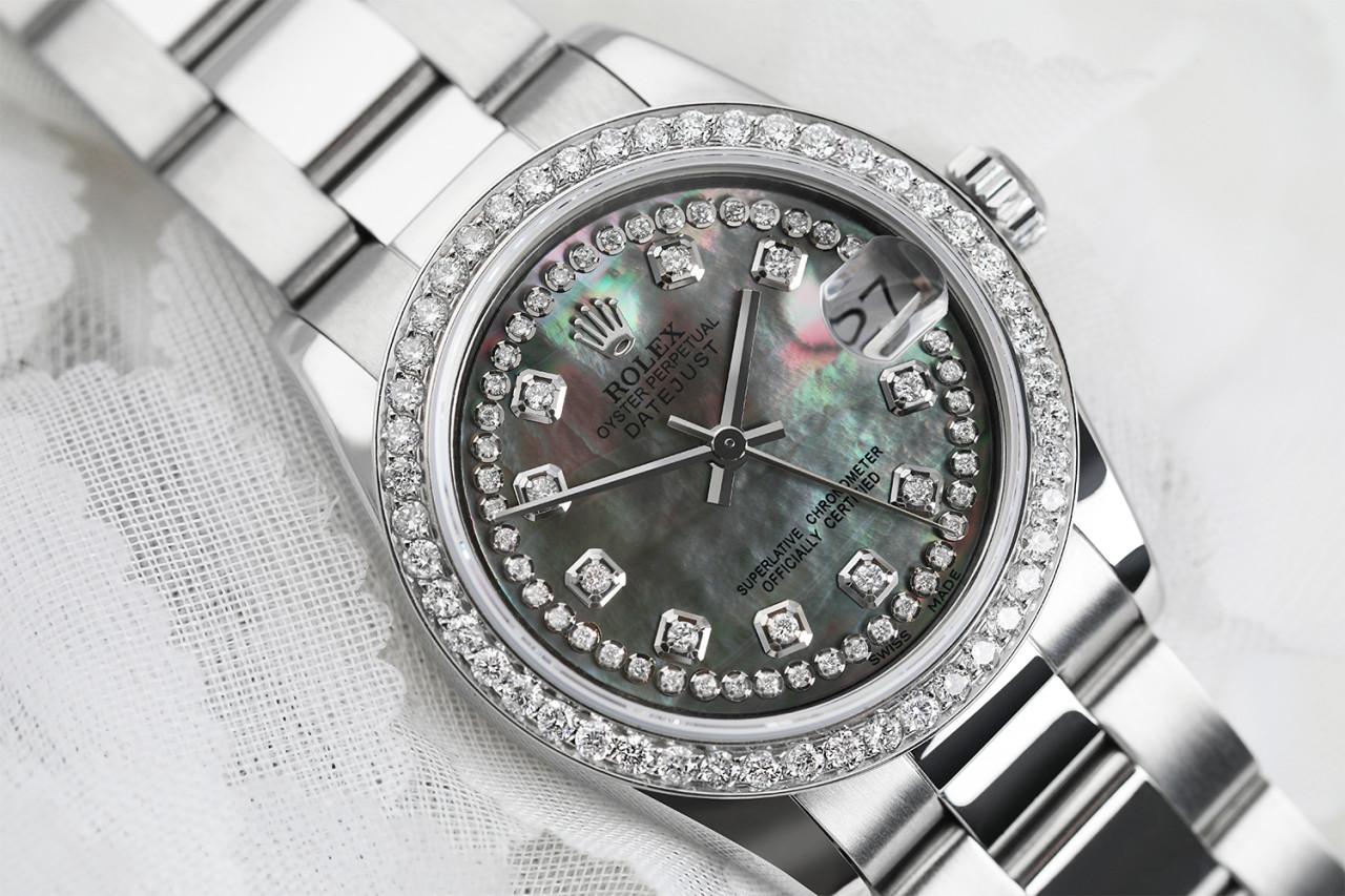 Rolex Black Pearl String 31mm Datejust SS Oyster Bracelet & Custom Diamond Bezel 68274
This watch is in like new condition. It has been polished, serviced and has no visible scratches or blemishes. All our watches come with a standard 1 year