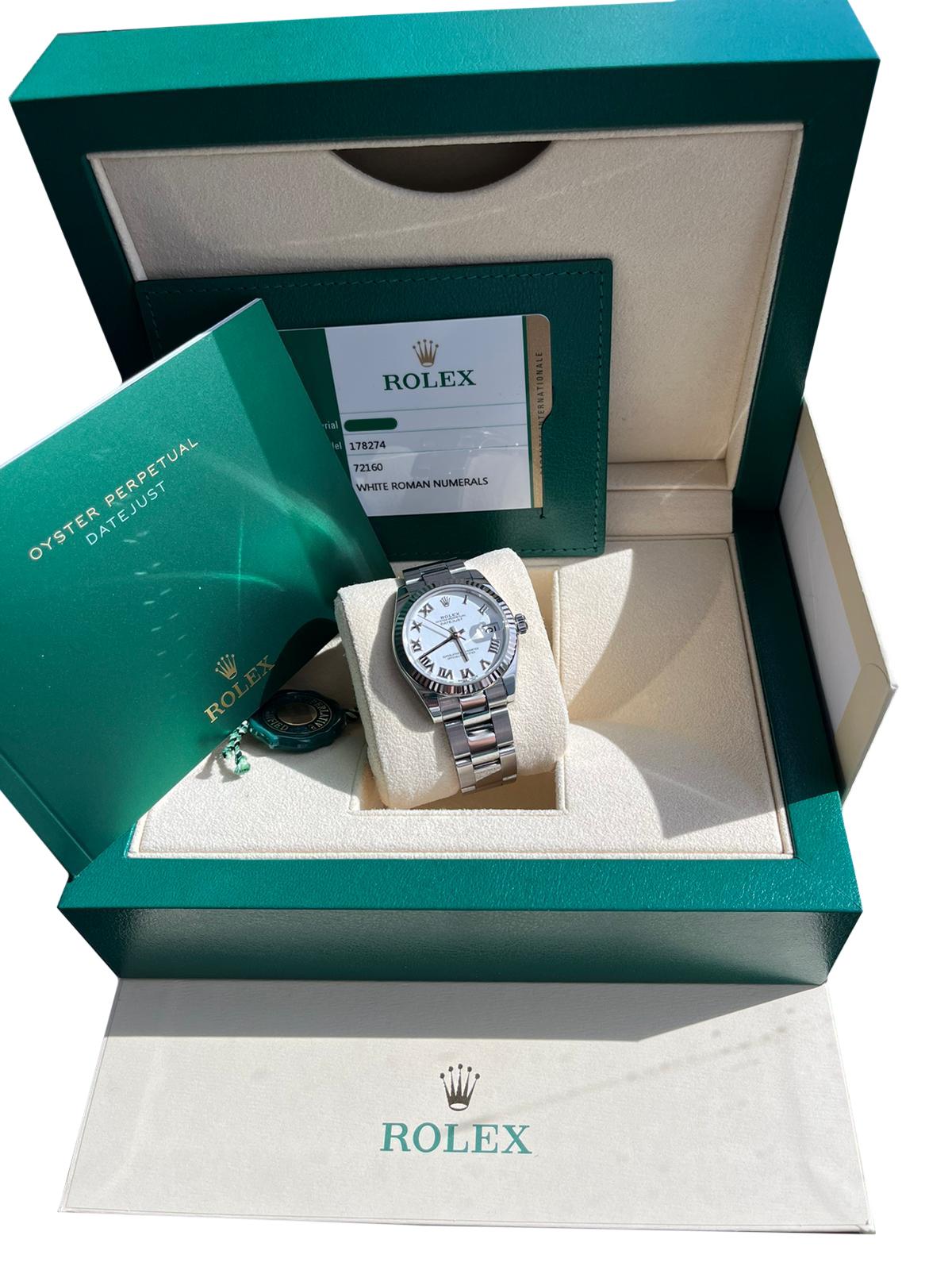 The Mid-size Rolex Lady Datejust 178274 for sale here is perfectly on trend with a larger 31mm Oyster case and a modern design. Styled to make a fashion-forward impact on the wrist, the case is equipped with a fluted bezel and a gorgeous White dial