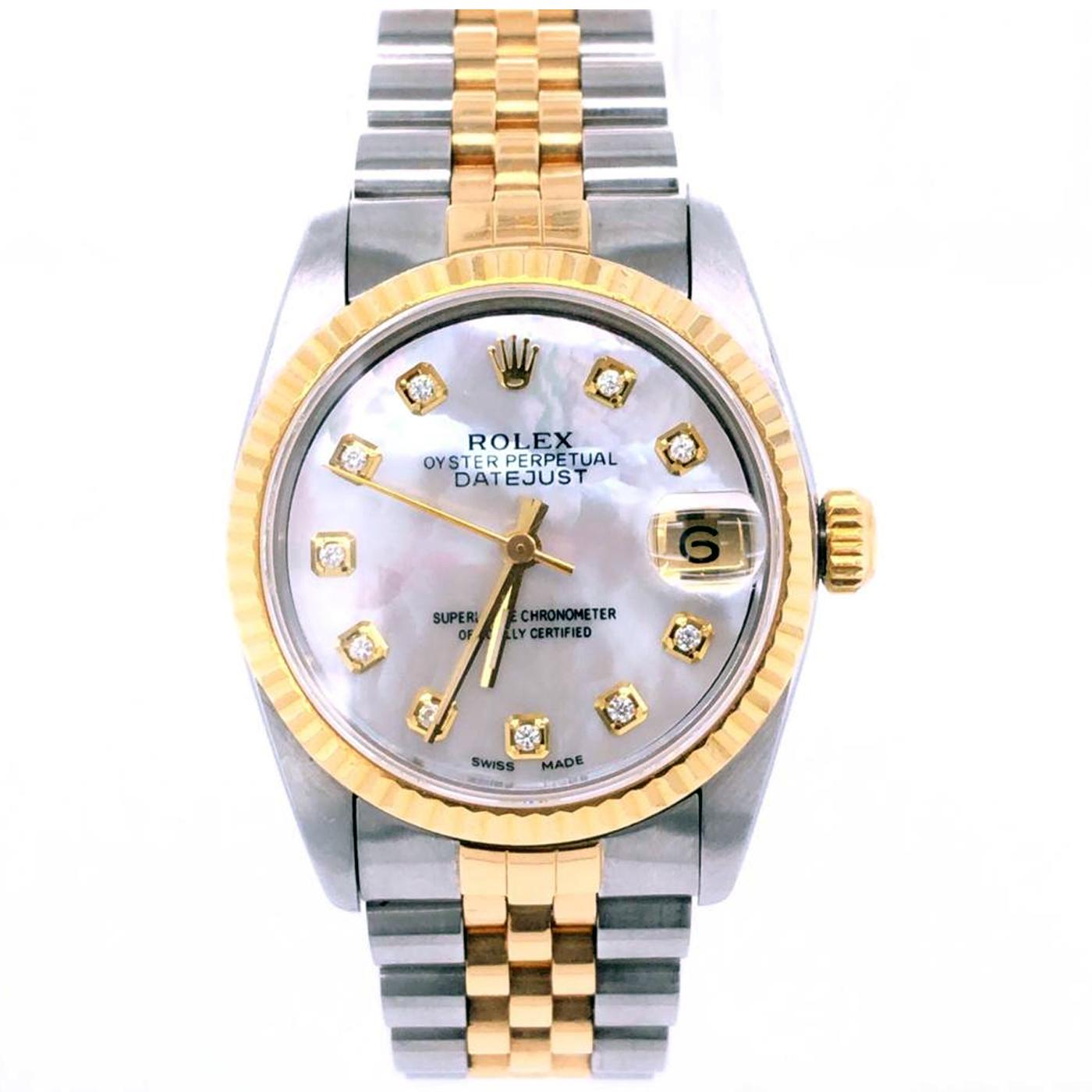 Rolex Datejust Midsize Steel Yellow Gold Mother of Pearls Diamond Watch 68273 Box Papers. Chronometer self-winding movement. Stainless steel oyster case 31 mm in diameter. Rolex logo on a 18K yellow gold crown. 18k yellow gold fluted bezel.