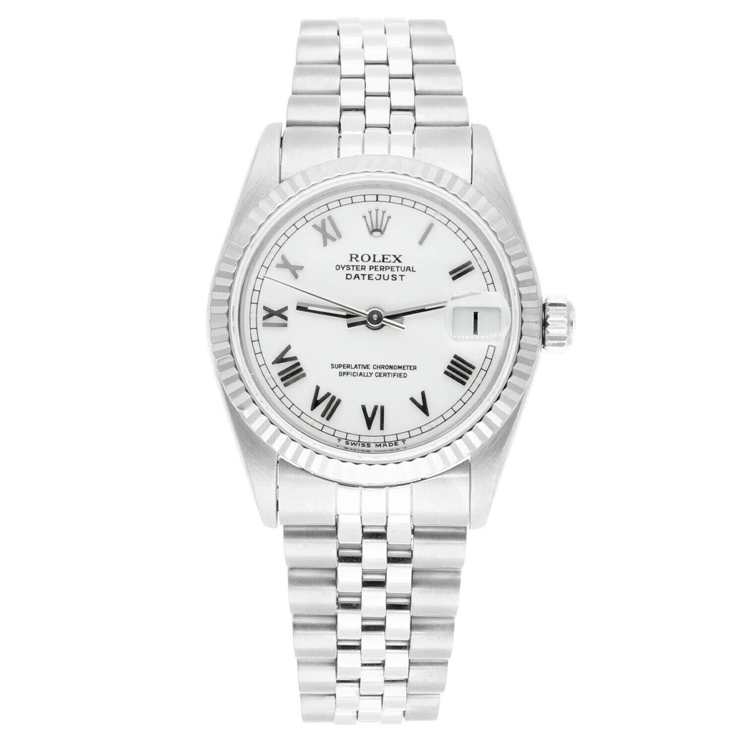Rolex Datejust 31mm White Roman Dial Stainless Steel Watch White Gold Bezel, Jubilee Bracelet, T series.
Silver-tone stainless steel case with a silver-tone stainless steel jubilee bracelet. Fixed 18kt white gold bezel. White dial with silver-tone