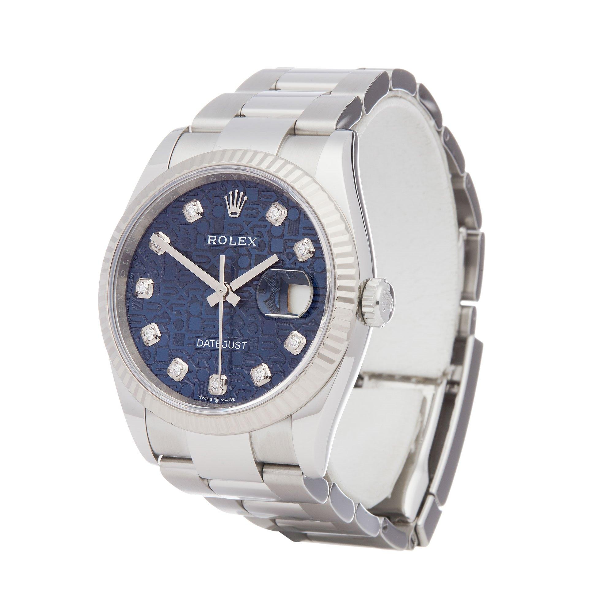 Xupes Reference: W007750
Manufacturer: Rolex
Model: Datejust
Model Variant: 36
Model Number: 126234
Age: 18-08-2019
Gender: Unisex
Complete With: Rolex Box, Manuals, Guarantee, Card Holder, Bezel Guard & Swing Tag
Dial: Blue Diamond 
Glass: Sapphire