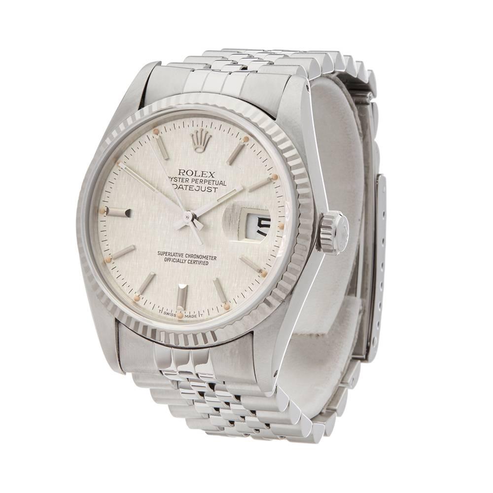 Ref: W5021
Manufacturer: Rolex
Model: Datejust
Model Ref: 16014
Age: 
Gender: Mens
Complete With: Xupes Presenation Pouch
Dial: Silver Linen Baton
Glass: Sapphire Crystal
Movement: Automatic
Water Resistance: To Manufacturers Specifications
Case: