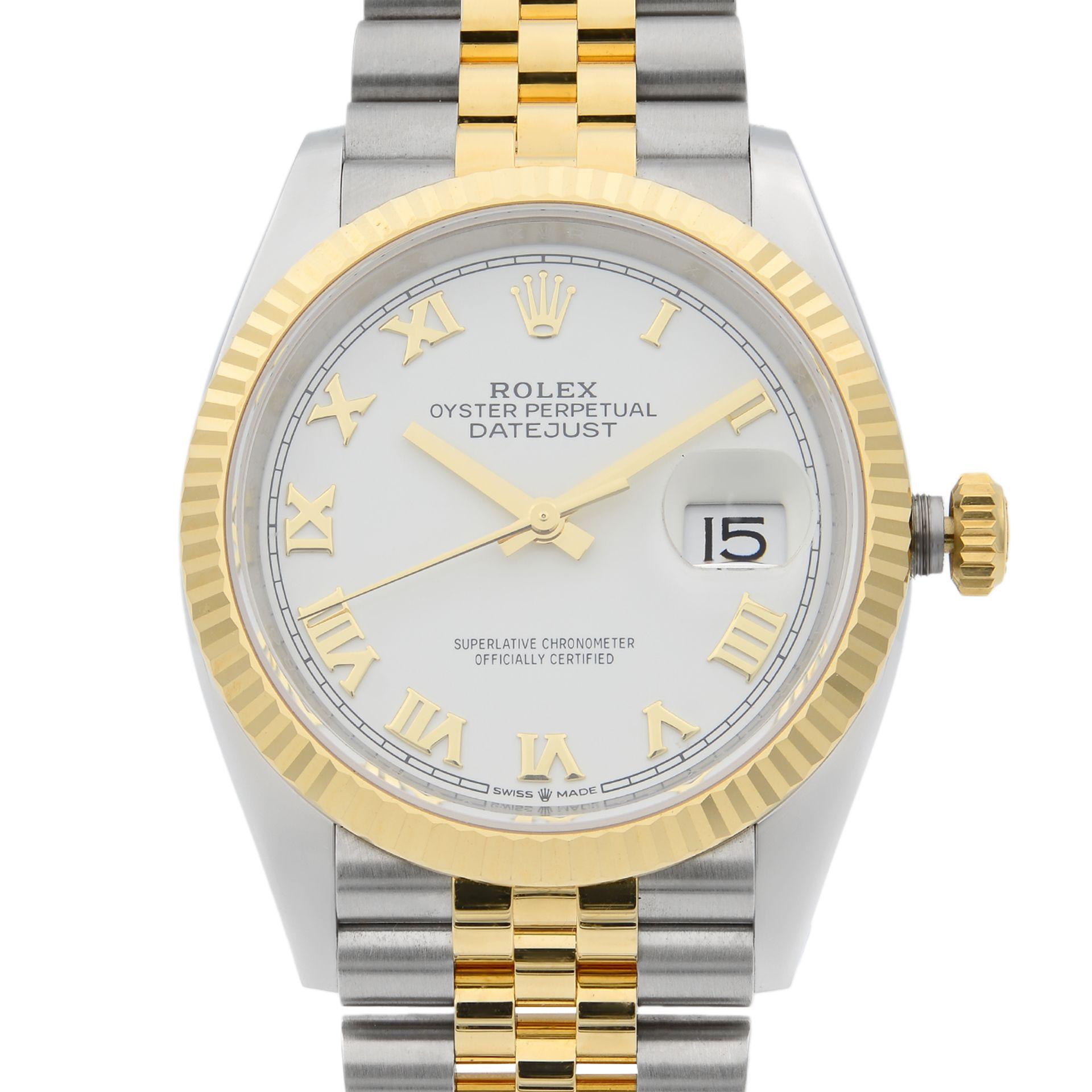 This display model Rolex Datejust  126233 is a beautiful men's timepiece that is powered by mechanical (automatic) movement which is cased in a stainless steel case. It has a round shape face, date indicator dial and has hand roman numerals style
