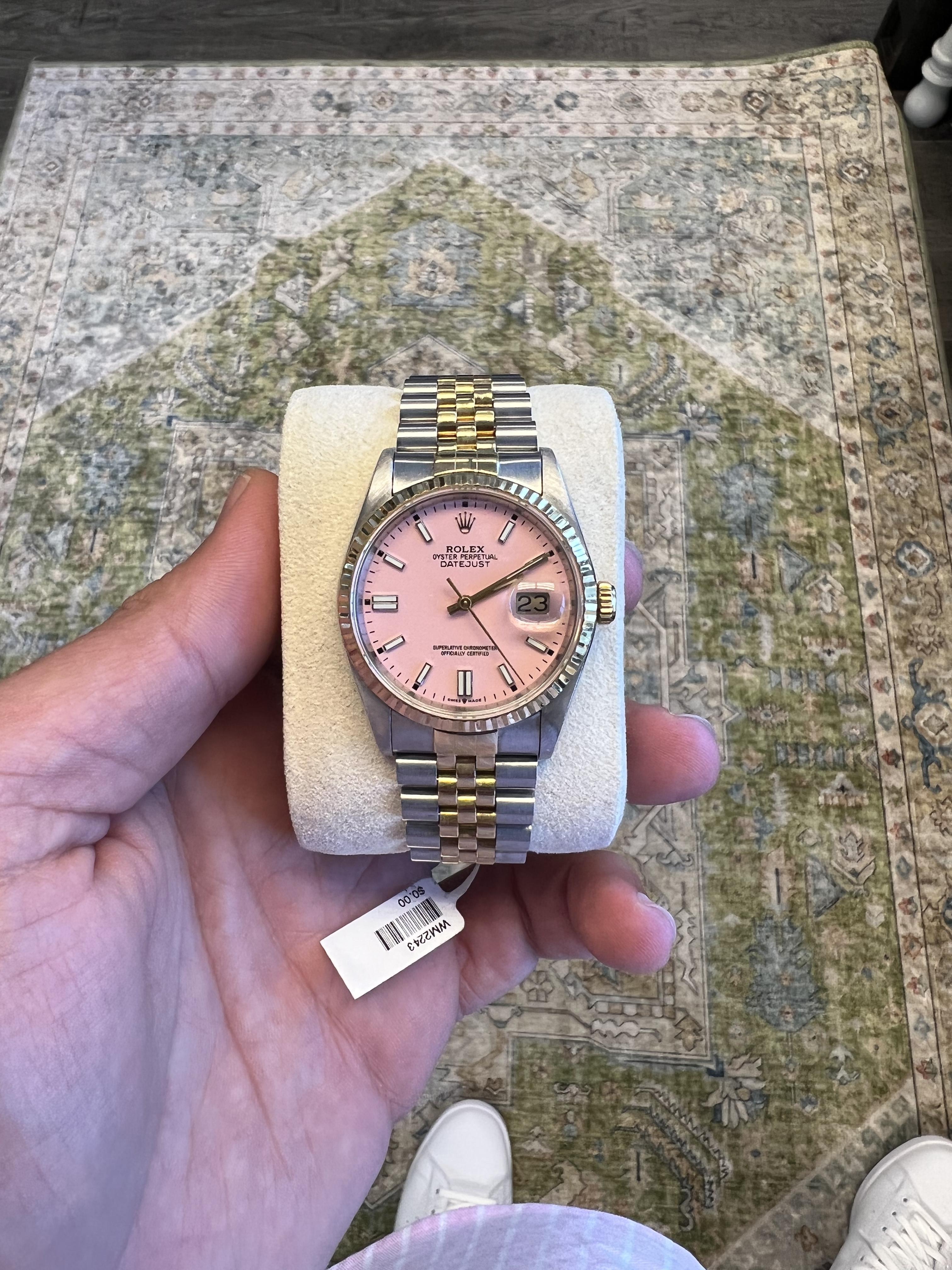 BRAND: Rolex
MODEL: Datejust
REFRENCE: 16233
SIZE: 36mm
CASE: 18k Yellow Gold and Stainless Steel
DIAL: Pink
BEZEL: 18k Yellow Gold
BAND: Jubilee 18k Yellow Gold and Stainless Steen
WRIST SIZE: 7.75
MOVEMENT: Automatic

Custom pink dial
Excellent