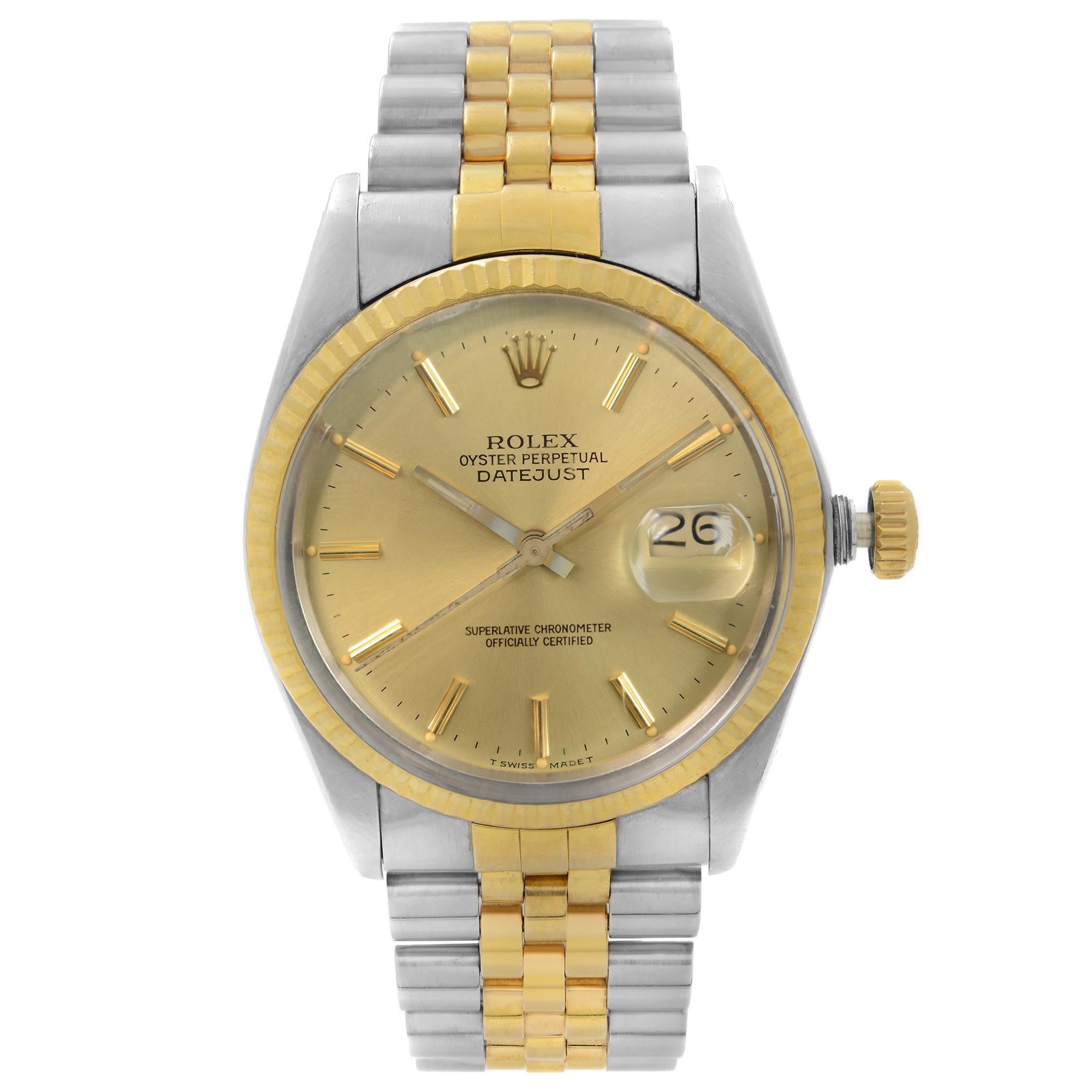 Pre Owned Rolex Datejust 36mm 18k Gold Steel Champagne Dial Automatic Men's Watch 16013.  The watch was produced in 1986. The Watch Bracelet Has a Moderate Slack, Minor Oxidation Shown on the Rolex Logo Crown at the 12 O'clock Position. The second