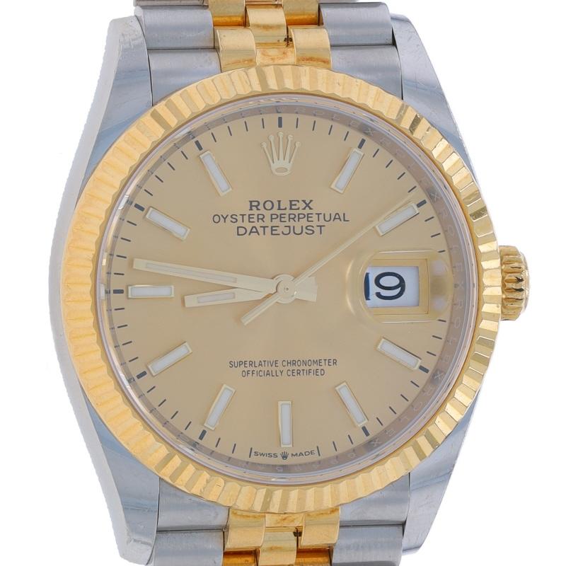 Brand: Rolex
Model: Datejust 36
Model Number: 126233
Movement: Automatic
Warranty: One Year
Date: 2018
Movement Maker: Swiss
Dial Color: Champagne

Metal Content: Stainless Steel & 18k Yellow Gold

Fastening Type: Fold-Over Clasp
Features: 
Fluted