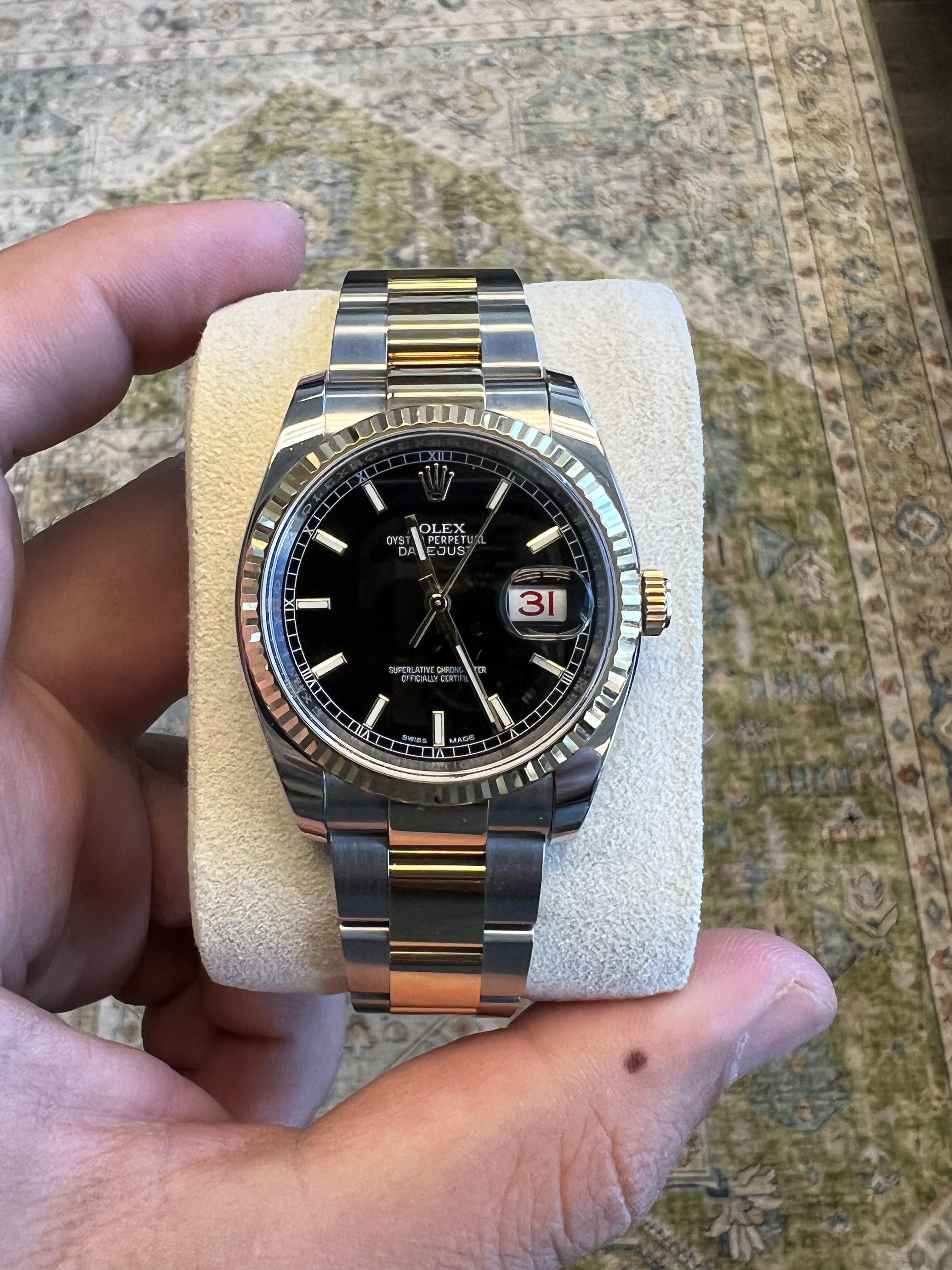 BRAND: Rolex
MODEL: Datejust 36
REFERENCE: 116233
SIZE: 36mm
DIAL: Black
BEZEL: 18k Yellow Gold
BAND: 18k Yellow Gold and Stainless Steel
MOVEMENT: Automatic

Mint
Box & Card

Accommodated with an up-to-date digital appraisal once purchased, upon
