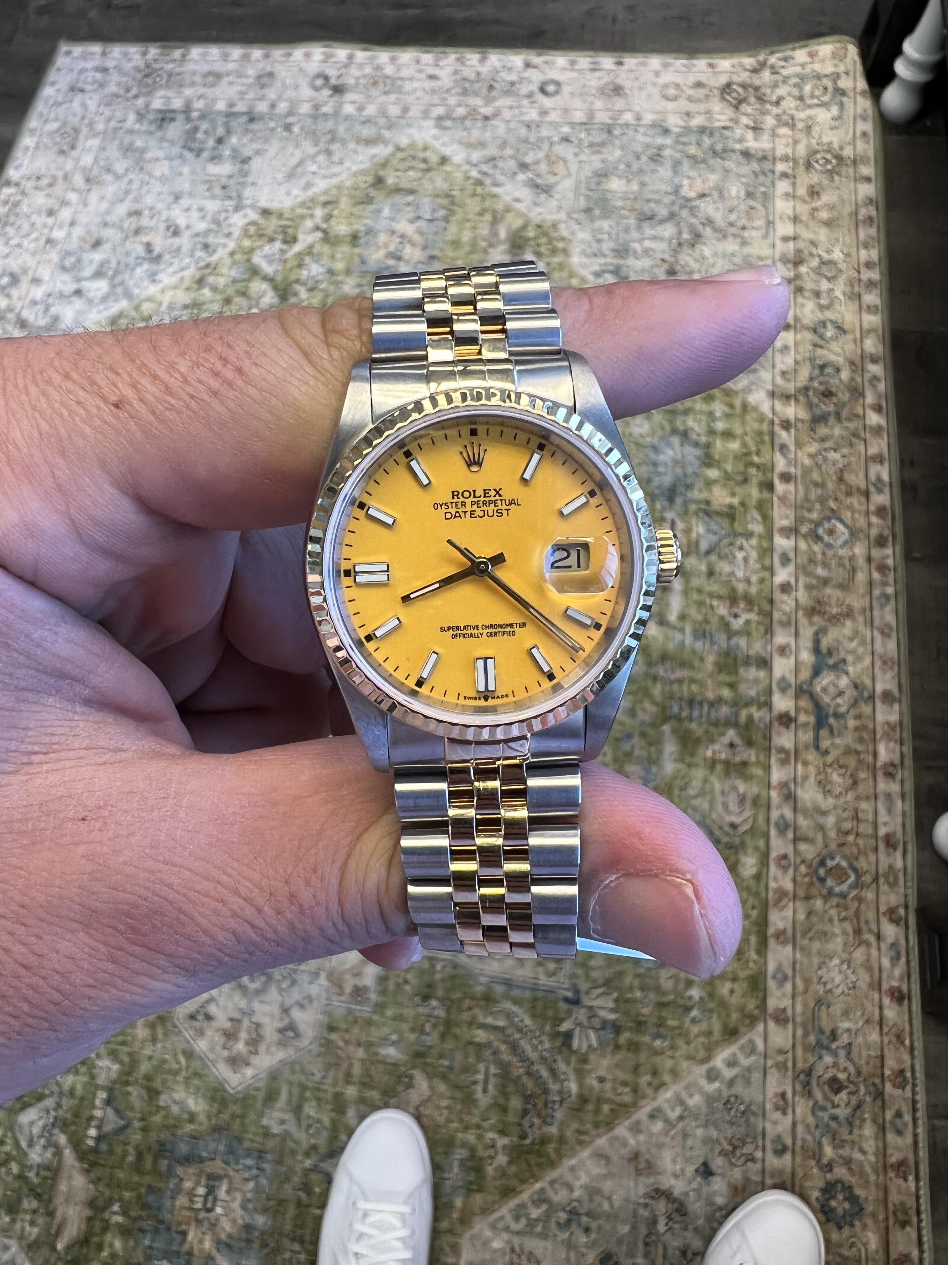 BRAND: Rolex
MODEL: Datejust
REFRENCE: 16233
SIZE: 36mm
CASE: 18k Yellow Gold and Stainless Steel
DIAL: Yellow
BEZEL: 18k Yellow Gold
BAND: Jubilee 18k Yellow Gold and Stainless Steen
WRIST SIZE: Apx 7.25
MOVEMENT: Automatic

Custom yellow dial
Mint