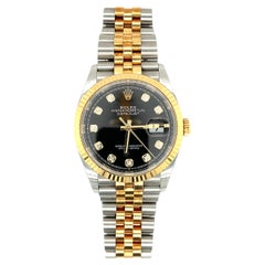 Rolex datejust 36 oyster steel and yellow gold black diamond-set dial 126233