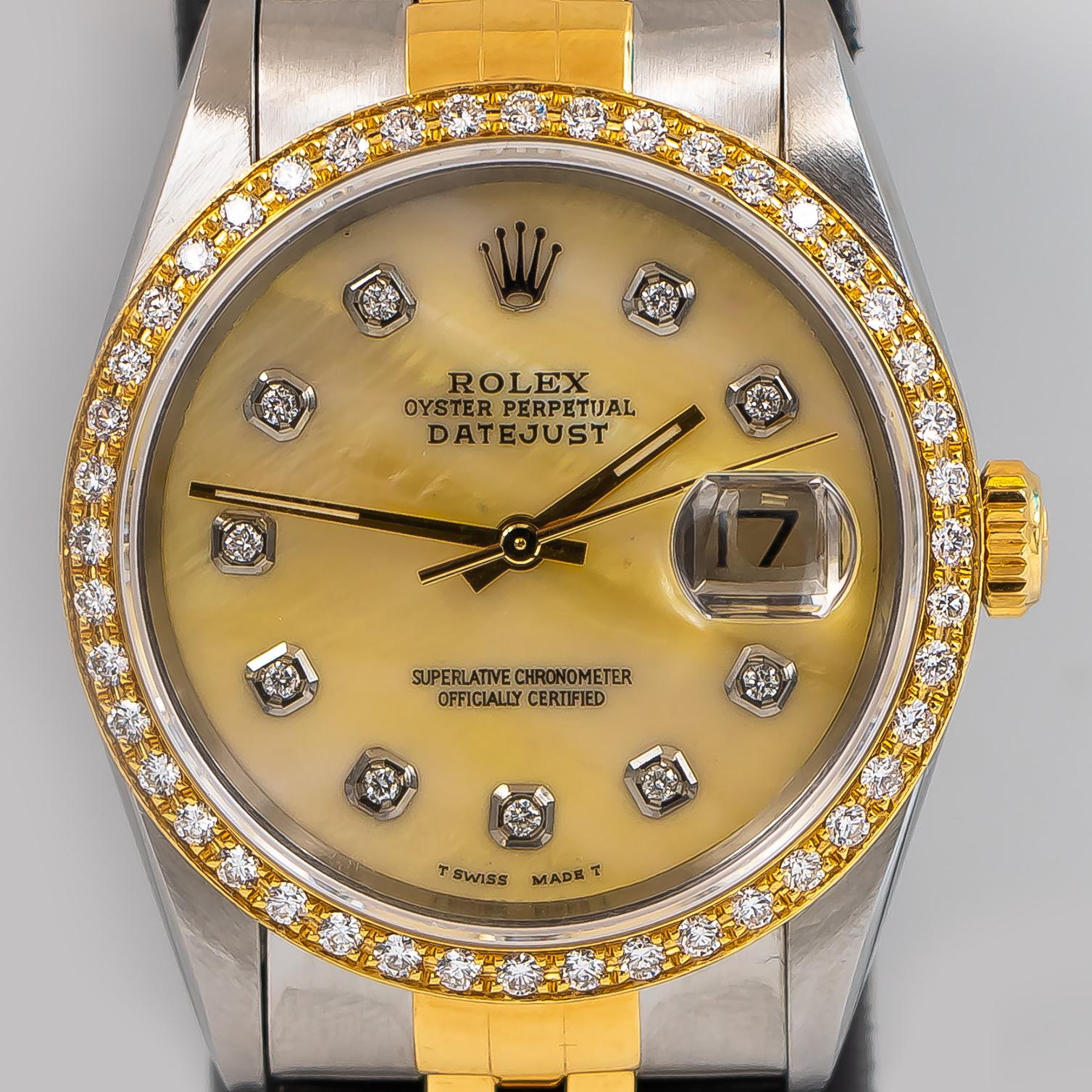 Brand: Rolex
Movement: T Swiss Made T, Perpetual, Mechanical, Self-Winding, Superlative Chronometer
Case Diameter: 36 mm
Waterproof to 100 Meters / 330 Feet
Dial: Mother Of Pearl Dial With 10 Factory Diamonds in 18K Gold
Bezel: 18K Yellow Gold With