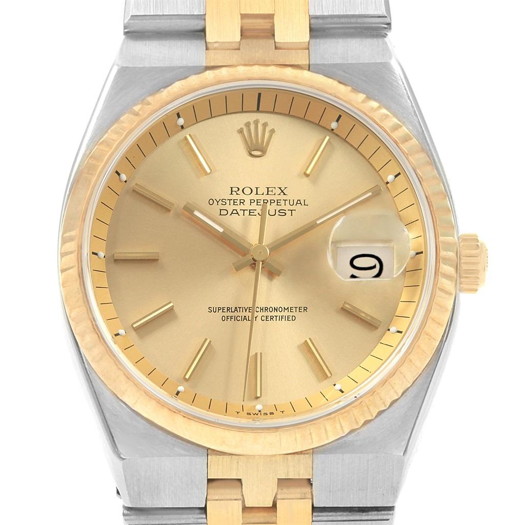Rolex Datejust 36 Steel 18K Yellow Gold Mens Watch 1630. Officially certified chronometer automatic self-winding movement. Stainless steel case 36 mm in diameter. Rolex logo on a 18K yellow gold crown. 18k yellow gold fluted bezel. Scratch resistant