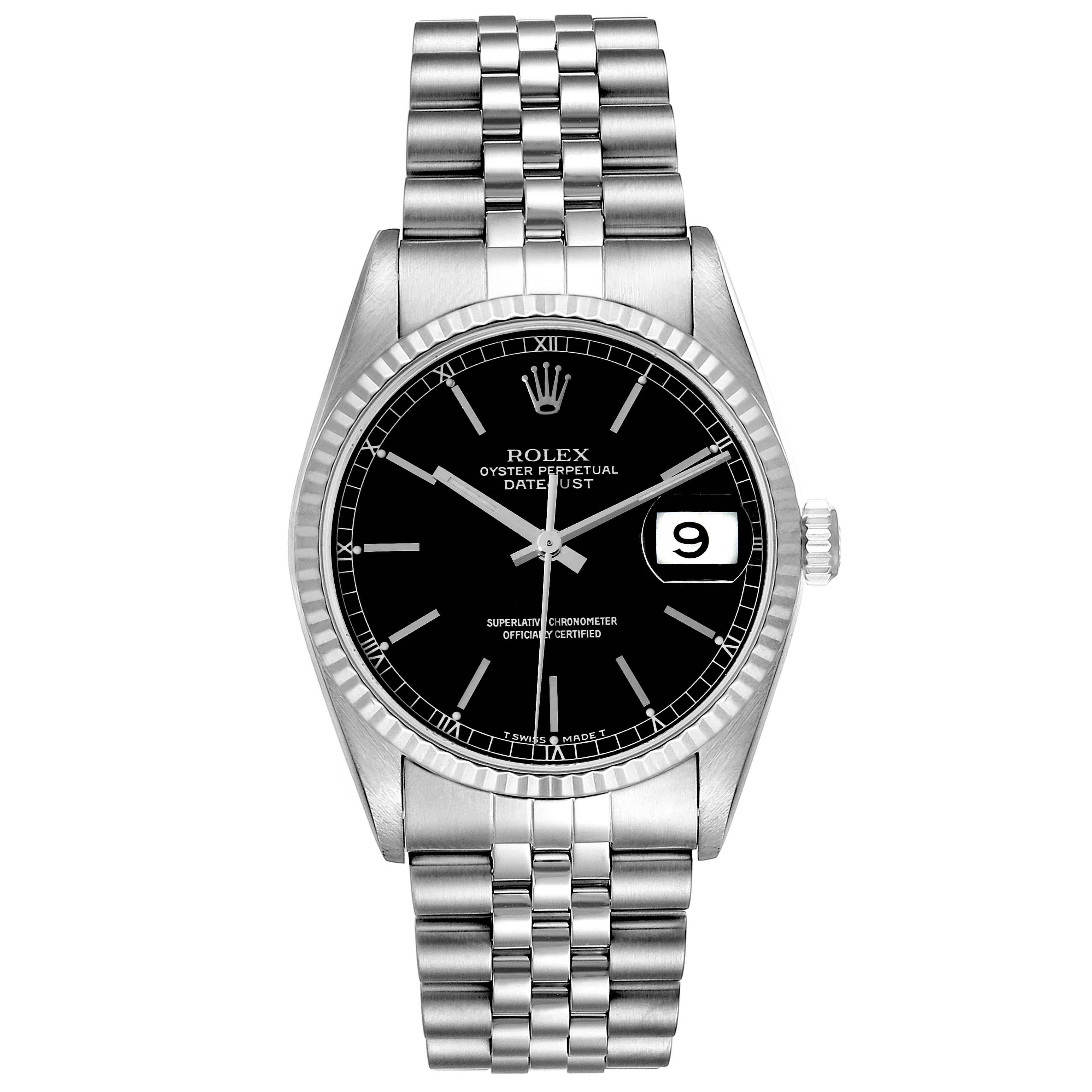 Rolex Datejust 36 Steel White Gold Black Dial Mens Watch 16234. Officially certified chronometer automatic self-winding movement. Stainless steel oyster case 36 mm in diameter. Rolex logo on the crown. 18k white gold fluted bezel. Scratch resistant