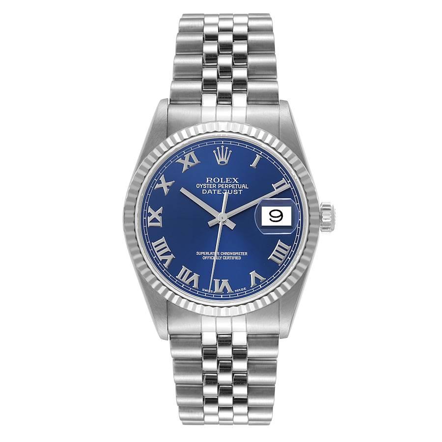 Rolex Datejust 36 Steel White Gold Fluted Bezel Blue Roman Dial Mens Watch 16234. Officially certified chronometer automatic self-winding movement. Stainless steel oyster case 36 mm in diameter. Rolex logo on the crown. 18k white gold fluted bezel.