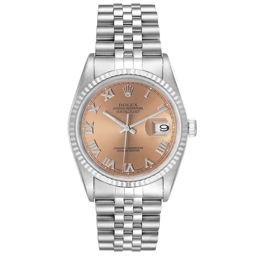 Rolex Datejust 36 Steel White Gold Salmon Dial Mens Watch 16234. Officially certified chronometer self-winding movement. Stainless steel oyster case 36 mm in diameter. Rolex logo on a crown. 18k white gold fluted bezel. Scratch resistant sapphire