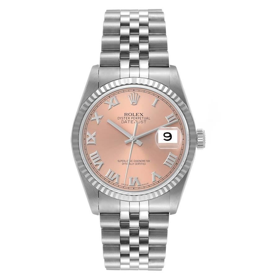 Rolex Datejust 36 Steel White Gold Salmon Dial Mens Watch 16234. Officially certified chronometer automatic self-winding movement. Stainless steel oyster case 36 mm in diameter. Rolex logo on the crown. 18k white gold fluted bezel. Scratch resistant