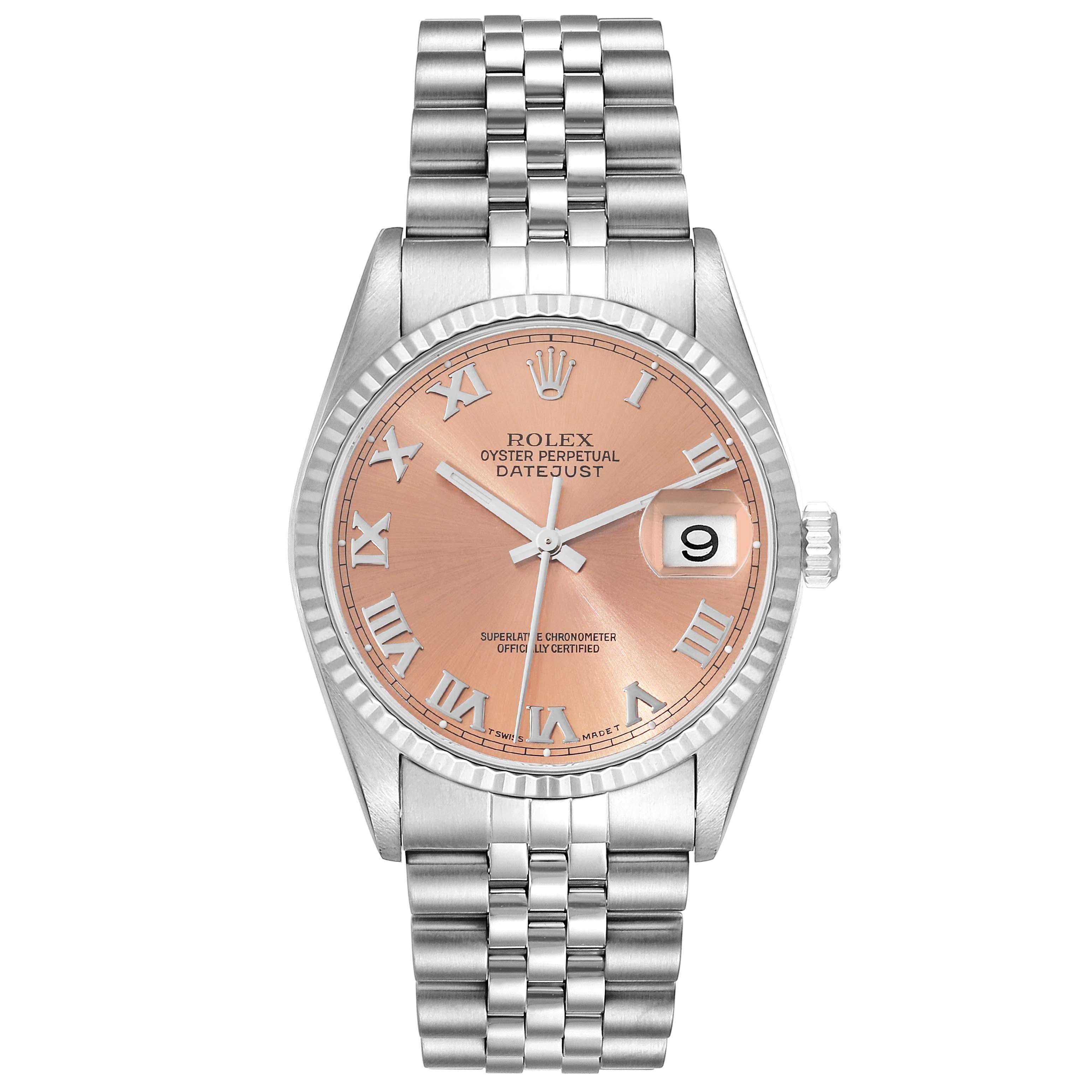 Rolex Datejust 36 Steel White Gold Salmon Roman Dial Mens Watch 16234. Officially certified chronometer automatic self-winding movement. Stainless steel oyster case 36 mm in diameter. Rolex logo on the crown. 18k white gold fluted bezel. Scratch