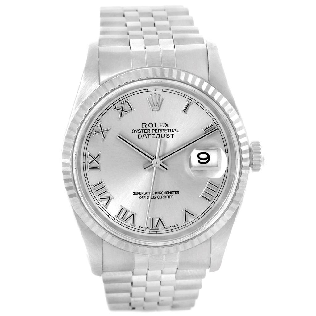 Rolex Datejust 36 Steel White Gold Silver Dial Mens Watch 16234. Officially certified chronometer self-winding movement with quickset date function. Stainless steel oyster case 36 mm in diameter. Rolex logo on a crown. 18k white gold fluted bezel.