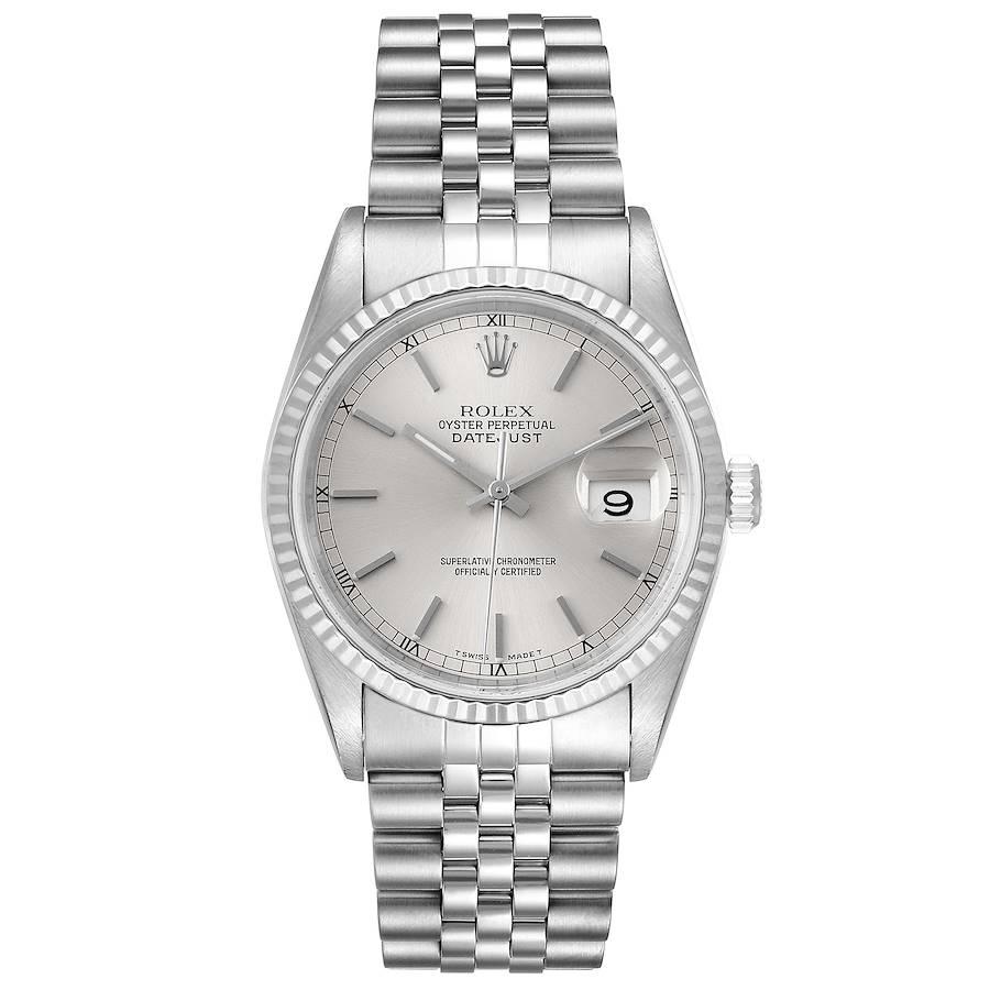 Rolex Datejust 36 Steel White Gold Silver Dial Mens Watch 16234. Officially certified chronometer self-winding movement. Stainless steel oyster case 36 mm in diameter. Rolex logo on a crown. 18k white gold fluted bezel. Scratch resistant sapphire
