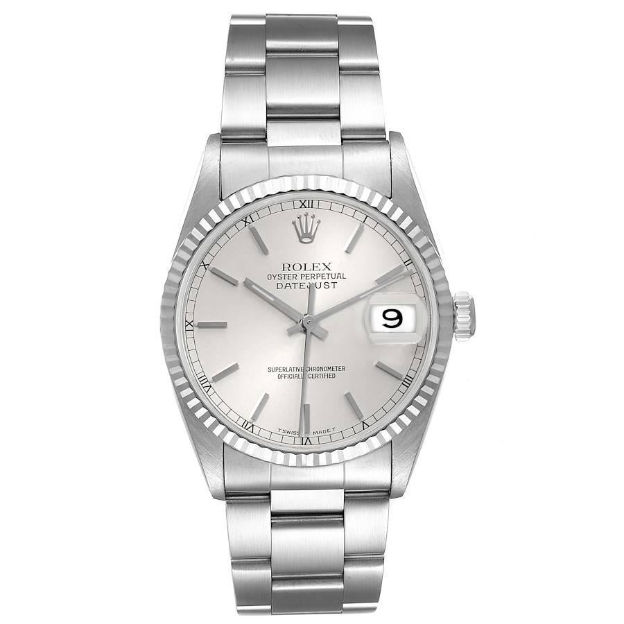 Rolex Datejust 36 Steel White Gold Silver Dial Mens Watch 16234. Officially certified chronometer automatic self-winding movement. Stainless steel oyster case 36 mm in diameter. Rolex logo on the crown. 18k white gold fluted bezel. Scratch resistant