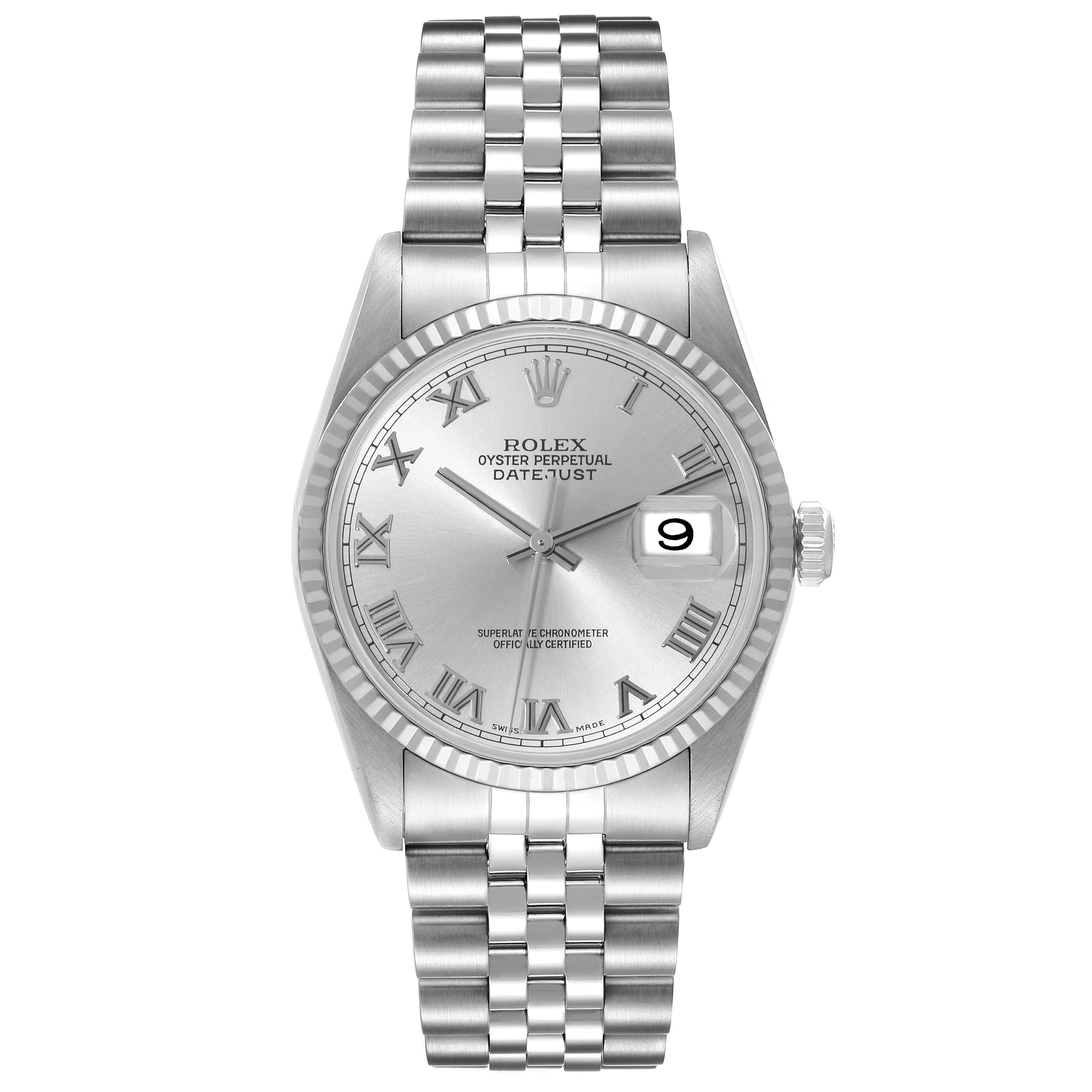 Rolex Datejust 36 Steel White Gold Silver Roman Dial Mens Watch 16234 Box Papers. Officially certified chronometer automatic self-winding movement. Stainless steel oyster case 36 mm in diameter. Rolex logo on a crown. 18k white gold fluted bezel.