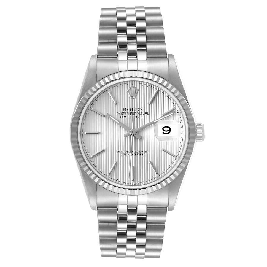 Rolex Datejust 36 Steel White Gold Silver Tapestry Dial Mens Watch 16234. Mouvement à remontage automatique certifié officiellement chronomètre. Boîtier oyster en acier inoxydable de 36 mm de diamètre. Logo Rolex sur une couronne. Lunette cannelée