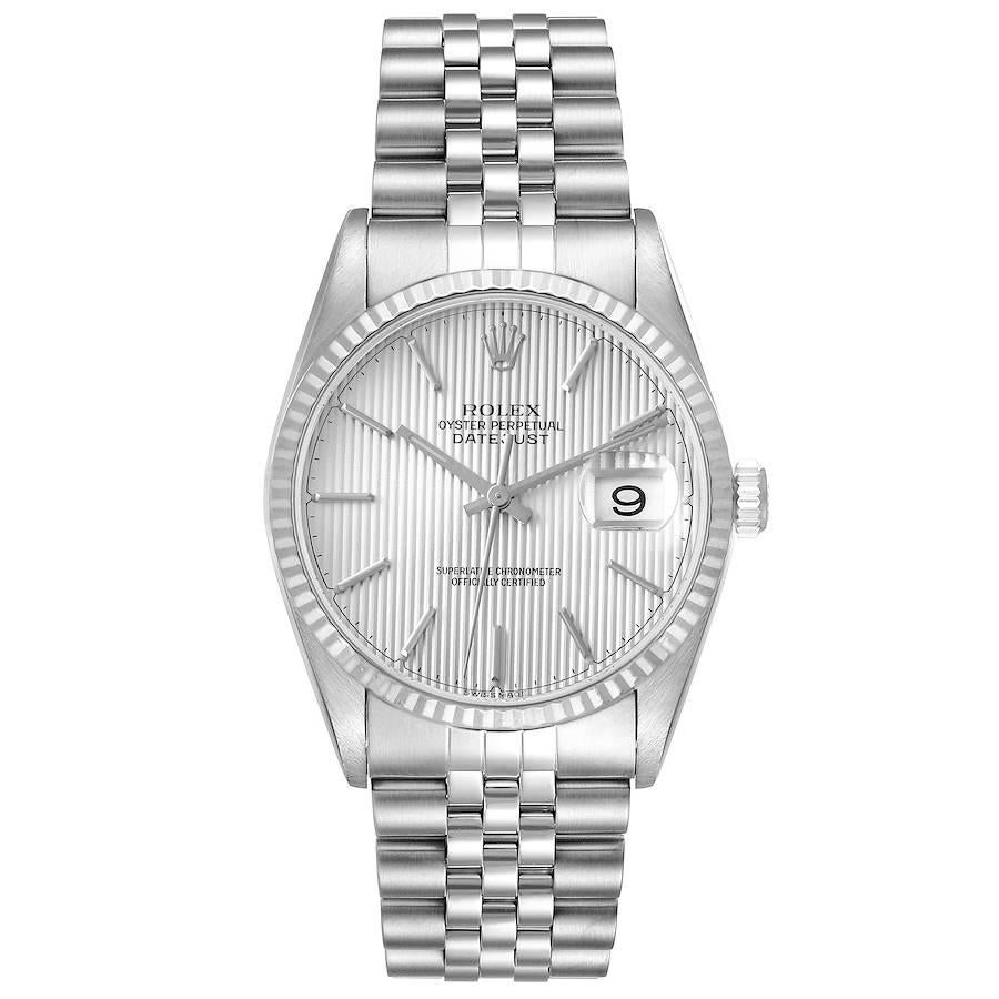 Rolex Datejust 36 Steel White Gold Silver Tapestry Dial Mens Watch 16234. Officially certified chronometer self-winding movement. Stainless steel oyster case 36 mm in diameter. Rolex logo on a crown. 18k white gold fluted bezel. Scratch resistant