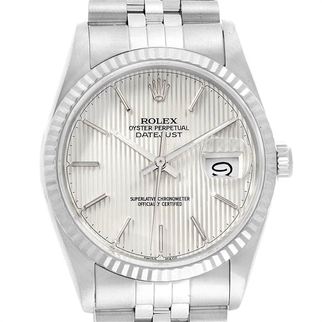 Rolex Datejust 36 Steel White Gold Tapestry Dial Mens Watch 16234. Officially certified chronometer self-winding movement. Stainless steel oyster case 36 mm in diameter. Rolex logo on a crown. 18k white gold fluted bezel. Scratch resistant sapphire