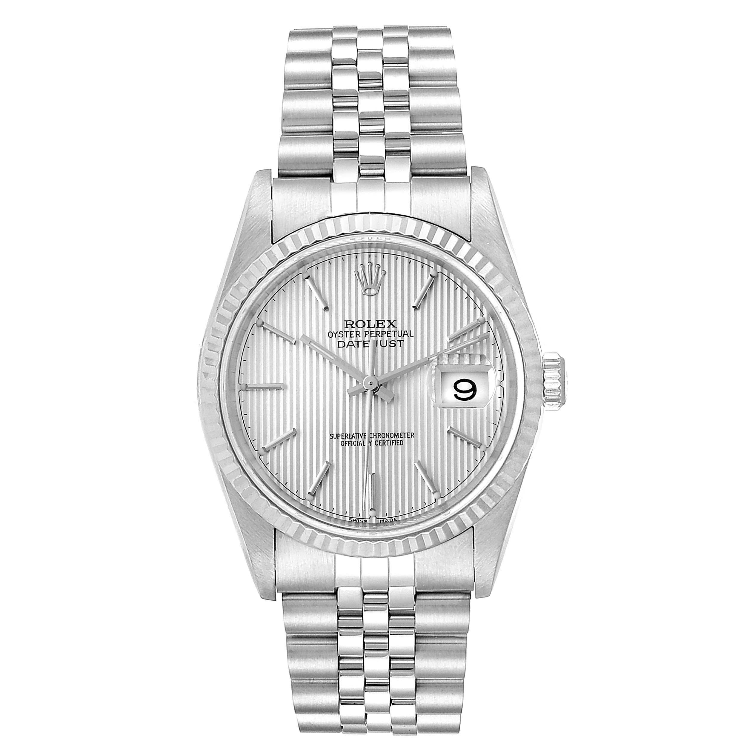 Rolex Datejust 36 Steel White Gold Tapestry Dial Mens Watch 16234. Officially certified chronometer self-winding movement. Stainless steel oyster case 36 mm in diameter. Rolex logo on a crown. 18k white gold fluted bezel. Scratch resistant sapphire