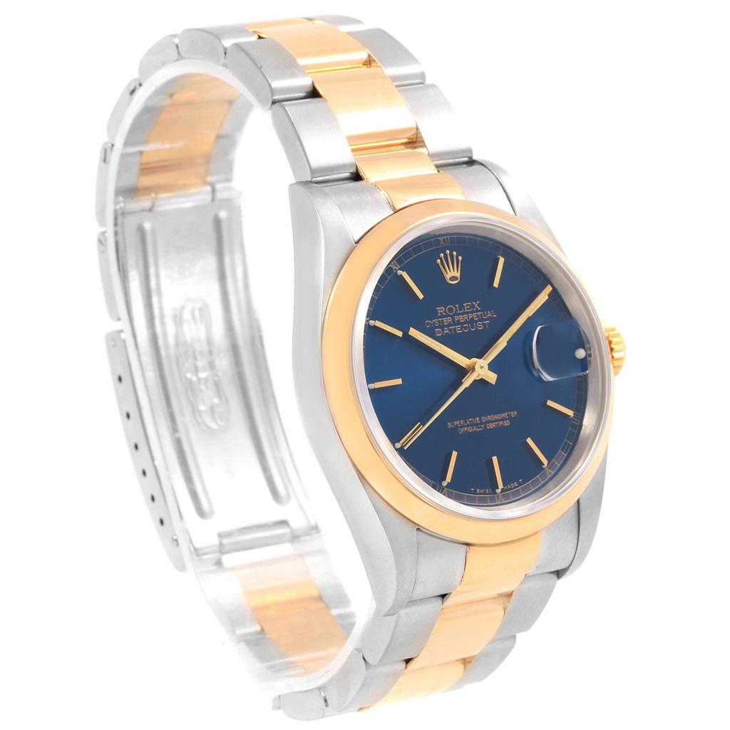 Rolex Datejust 36 Steel Yellow Gold Blue Dial Mens Watch 16203. Officially certified chronometer self-winding movement. Stainless steel case 36 mm in diameter. Rolex logo on a 18K yellow gold crown. 18k yellow gold smooth domed bezel. Scratch