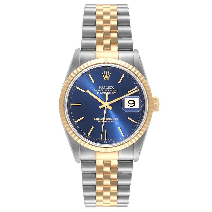 Rolex Datejust 36 Steel Yellow Gold Blue Dial Mens Watch 16233. Officially certified chronometer automatic self-winding movement. Stainless steel case 36 mm in diameter.  Rolex logo on an 18K yellow gold crown. 18k yellow gold fluted bezel. Scratch