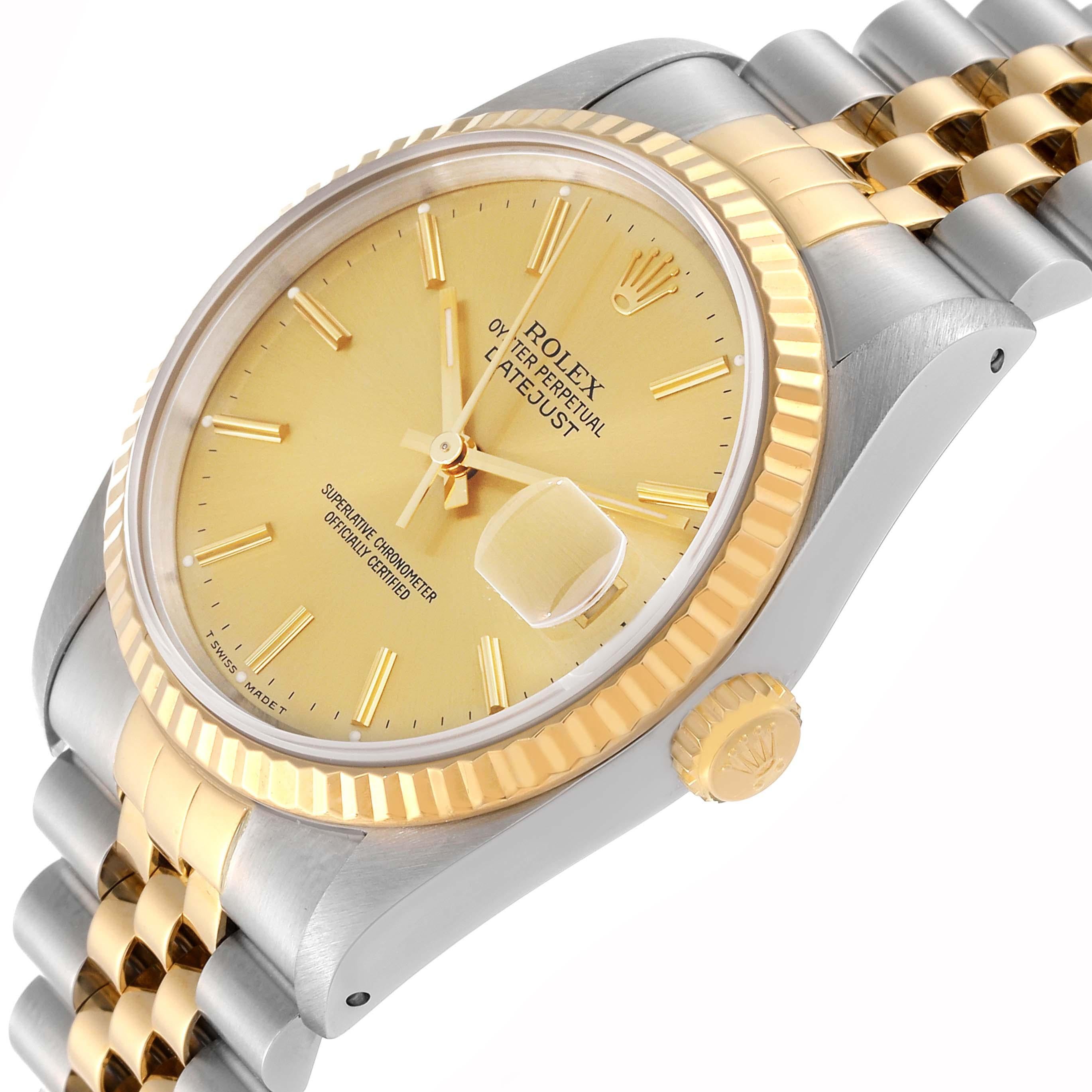 Rolex Datejust 36 Steel Yellow Gold Champagne Dial Mens Watch 16233. Officially certified chronometer automatic self-winding movement. Stainless steel case 36 mm in diameter.  Rolex logo on an 18K yellow gold crown. 18k yellow gold fluted bezel.