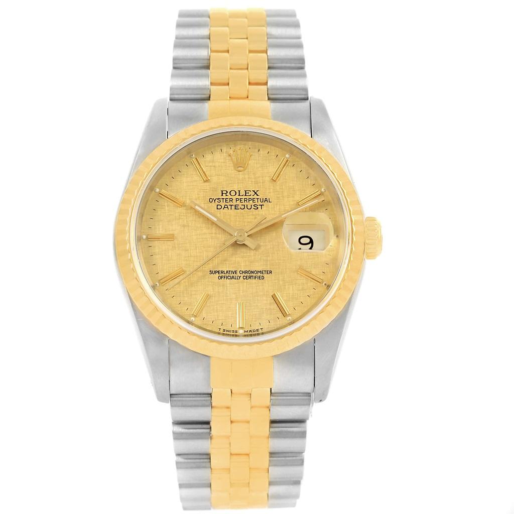 Rolex Datejust 36 Steel Yellow Gold Linen Dial Mens Watch 16233. Officially certified chronometer self-winding movement with quickset date function. Stainless steel case 36.0 mm in diameter. Rolex logo on a 18K yellow gold crown. 18k yellow gold