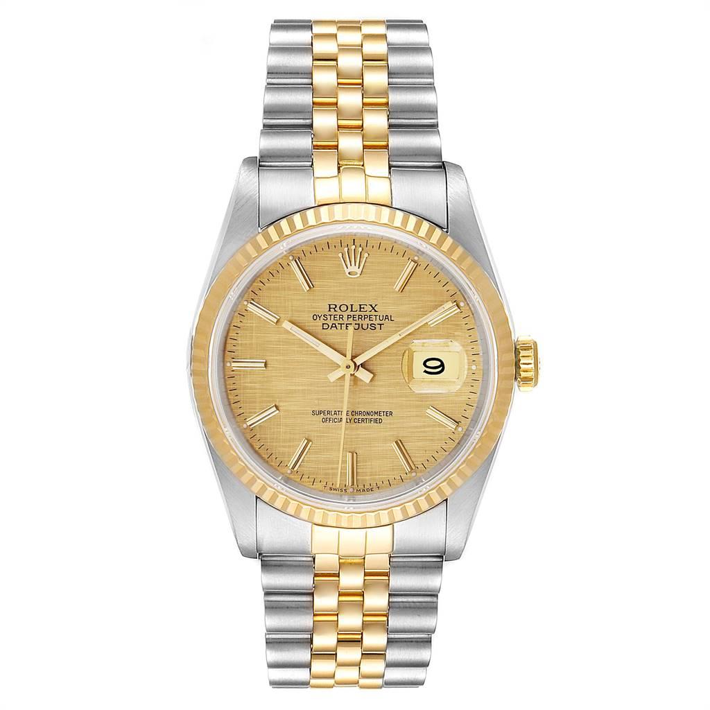 Rolex Datejust 36 Steel Yellow Gold Linen Dial Mens Watch 16233. Officially certified chronometer self-winding movement. Stainless steel case 36.0 mm in diameter.  Rolex logo on a 18K yellow gold crown. 18k yellow gold fluted bezel. Scratch