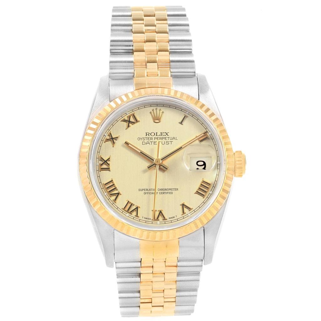 Rolex Datejust 36 Steel Yellow Gold Roman Dial Mens Watch 16233. Officially certified chronometer self-winding movement. Stainless steel case 36 mm in diameter. Rolex logo on a 18K yellow gold crown. 18k yellow gold fluted bezel. Scratch resistant