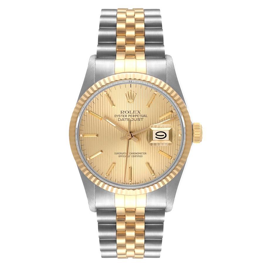 Rolex Datejust 36 Steel Yellow Gold Tapestry Dial Vintage Mens Watch 16013. Officially certified chronometer self-winding movement. Stainless steel oyster case 36.0 mm in diameter. Rolex logo on a crown. 18k yellow gold fluted bezel. Acrylic crystal