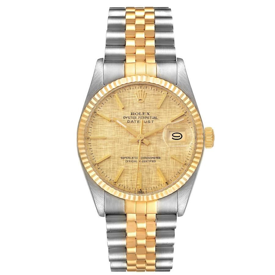 Rolex Datejust 36 Steel Yellow Gold Vintage Linen Dial Mens Watch 16013. Officially certified chronometer self-winding movement. Stainless steel and 18K yellow gold oyster case 36.0 mm in diameter. Rolex logo on a crown. 18k yellow gold fluted