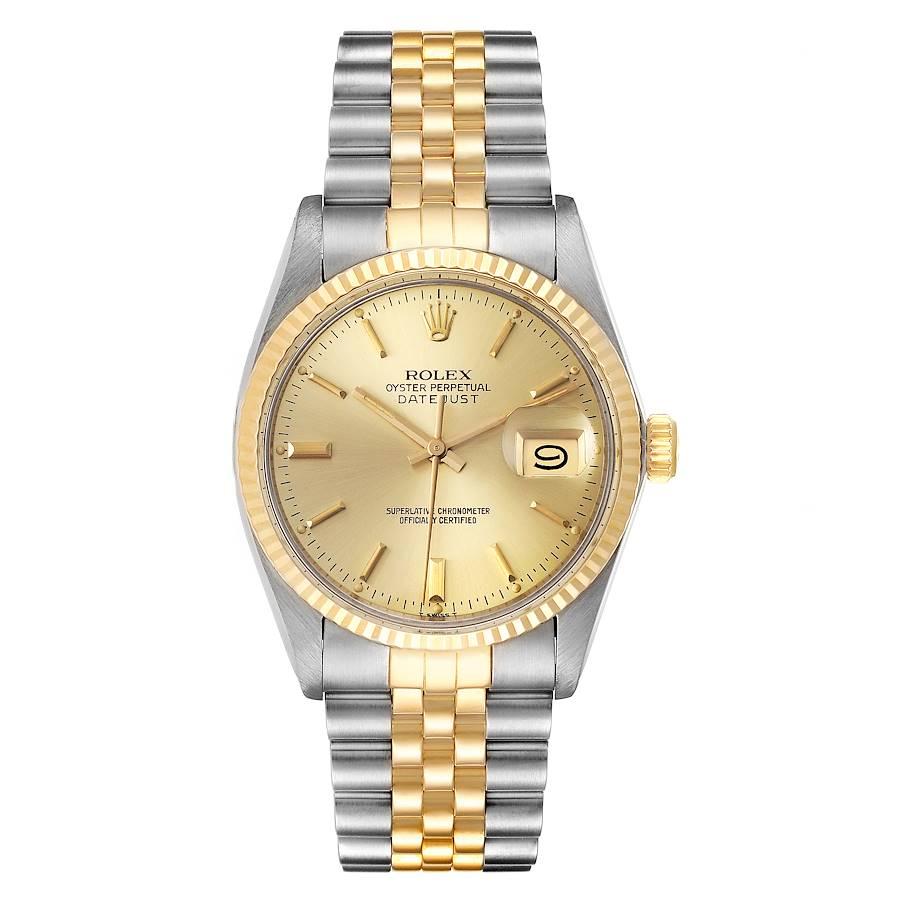 Rolex Datejust 36 Steel Yellow Gold Vintage Mens Watch 16013. Officially certified chronometer self-winding movement. Stainless steel and 18K yellow gold oyster case 36.0 mm in diameter. Rolex logo on a crown. 18k yellow gold fluted bezel. Acrylic