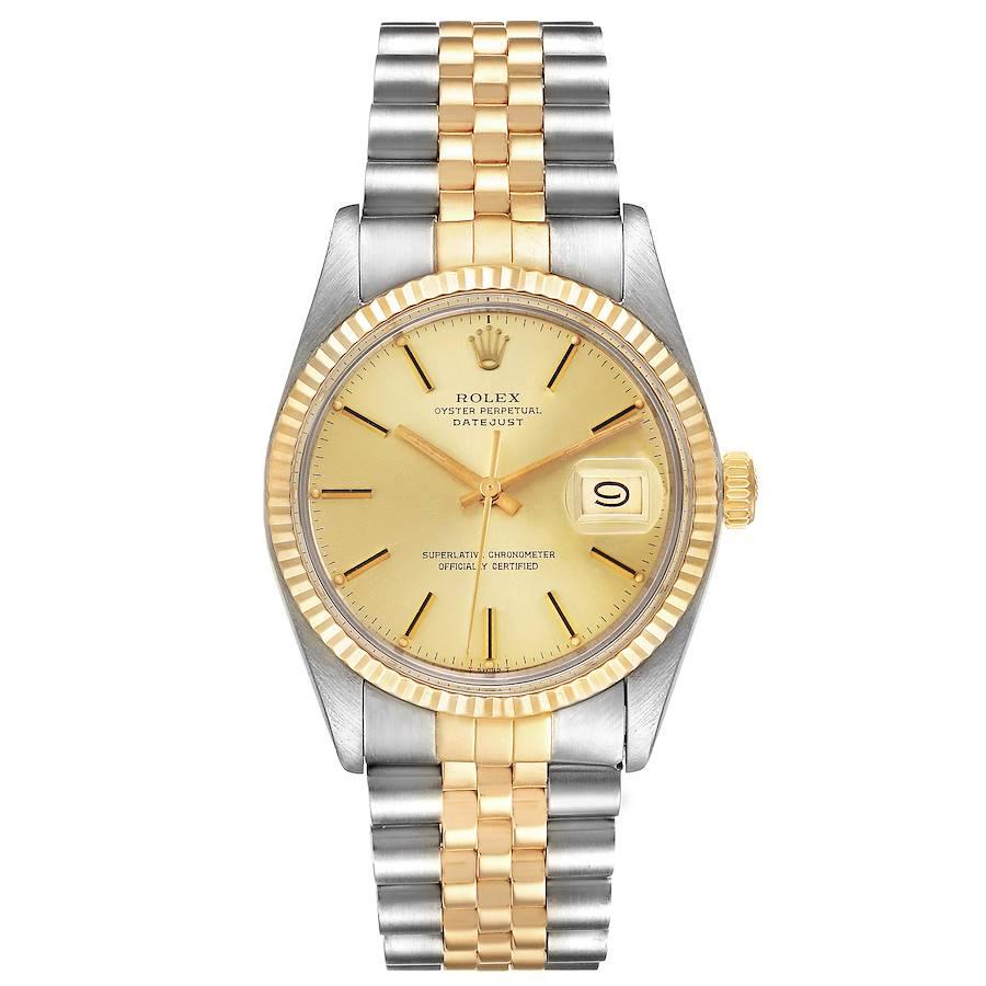 Rolex Datejust 36 Steel Yellow Gold Vintage Mens Watch 16013. Officially certified chronometer self-winding movement. Stainless steel and 18K yellow gold oyster case 36.0 mm in diameter. Rolex logo on a crown. 18k yellow gold fluted bezel. Acrylic