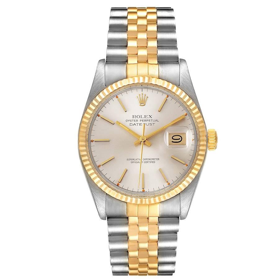 Rolex Datejust 36 Steel Yellow Gold Vintage Mens Watch 16013. Officially certified chronometer self-winding movement. Stainless steel oyster case 36.0 mm in diameter. Rolex logo on a crown. 18k yellow gold fluted bezel. Acrylic crystal with cyclops
