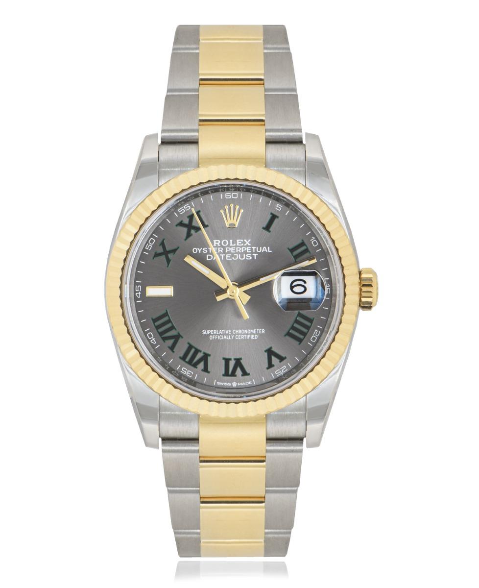 An unworn Oystersteel and yellow gold 36mm Datejust by Rolex, featuring the popular Wimbledon dial and a yellow gold fluted bezel. The Oyster bracelet comes with a folding Oysterclasp equipped with the Easylink 5mm comfort extension link. Fitted