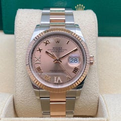 Montre unisexe Rolex Datejust 36mm 126231 acier or rose 18k Sundust cadran diamant