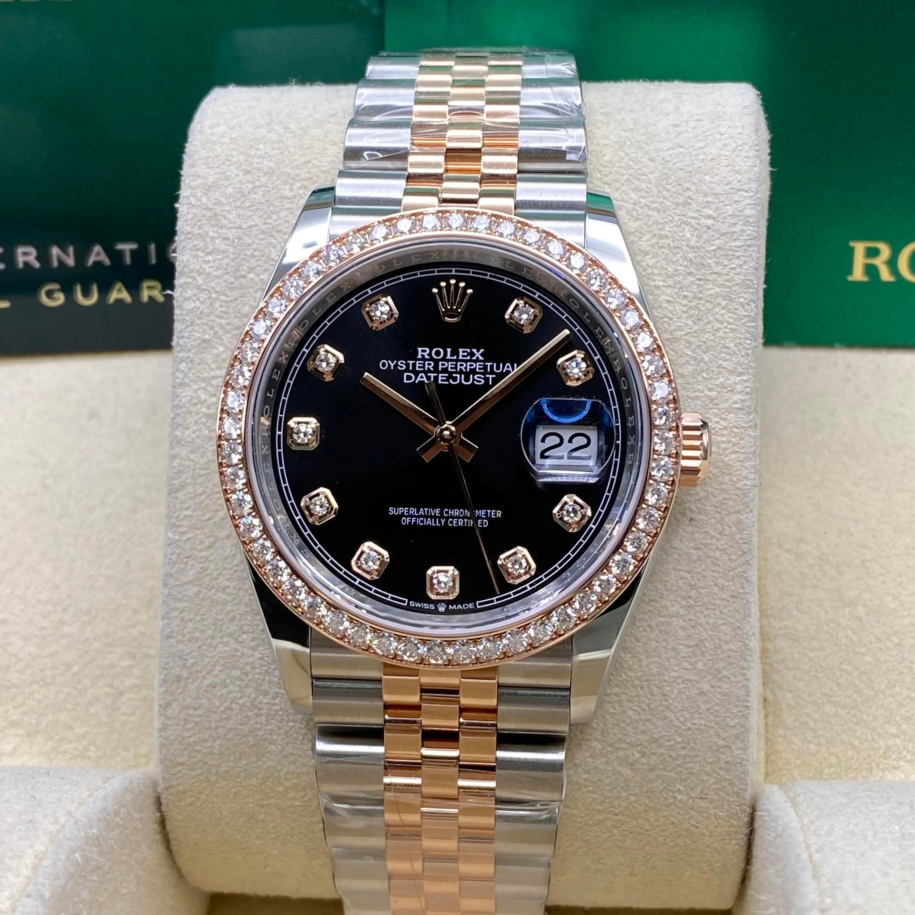 Unworn. Comes with original box and papers.