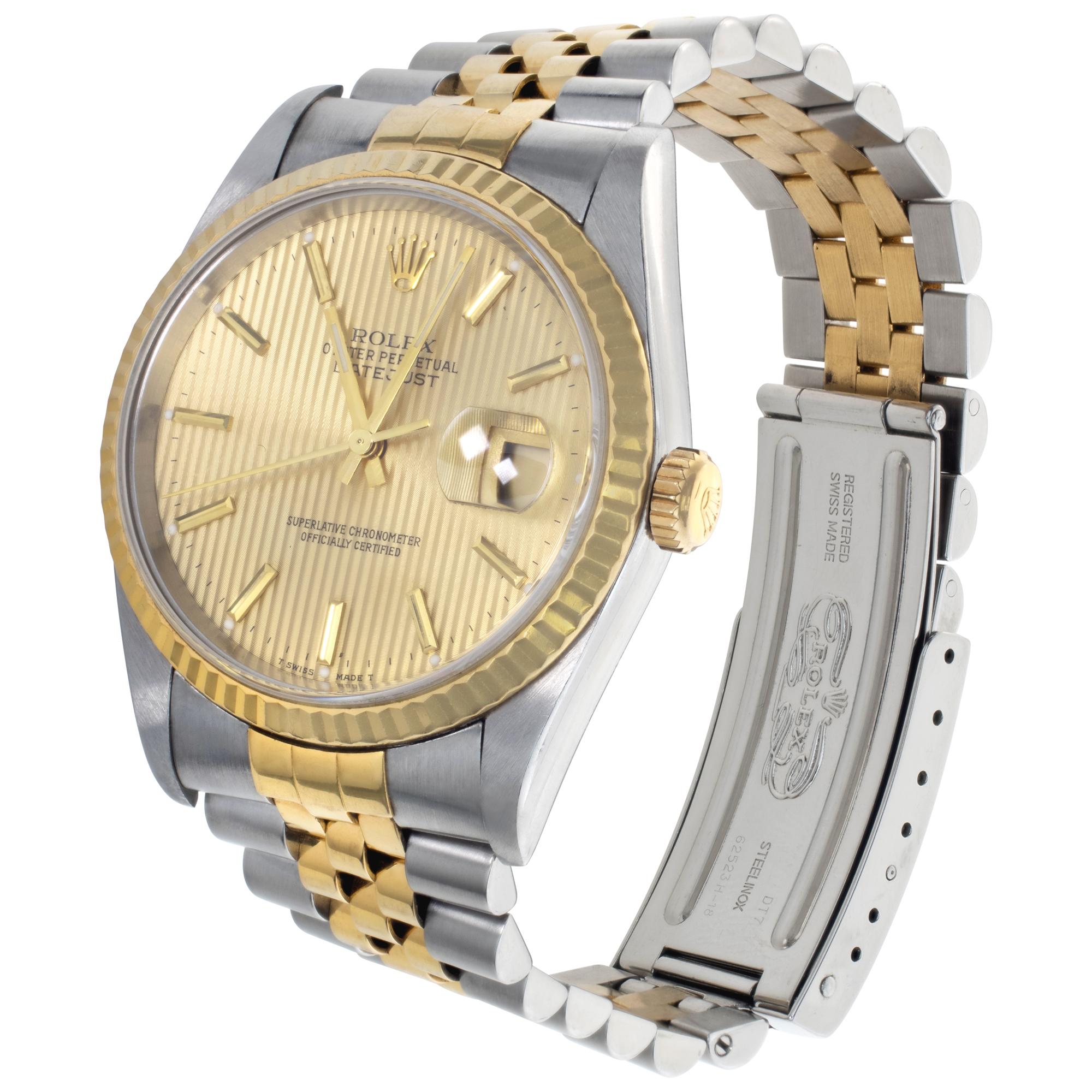 Rolex Datejust in 18k yellow gold and stainless steel with a champagne tapestry dial. Auto w/ sweep seconds and date. 36 mm case size. **Bank wire only at this price** Ref 16233. Circa 2002. Fine Pre-owned Rolex Watch.

 Certified preowned Sport