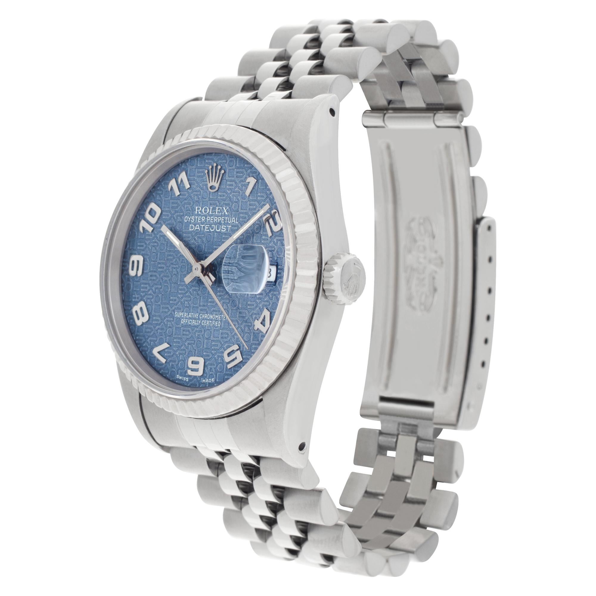 Rolex Datejust with blue Jubilee/Anniversary dial in stainless steel with 18k white gold fluted bezel.  Auto w/ sweep seconds and date. Ref 16234. Circa 1995.  **Bank wire only at this price** Fine Pre-owned Rolex Watch. Certified preowned Classic