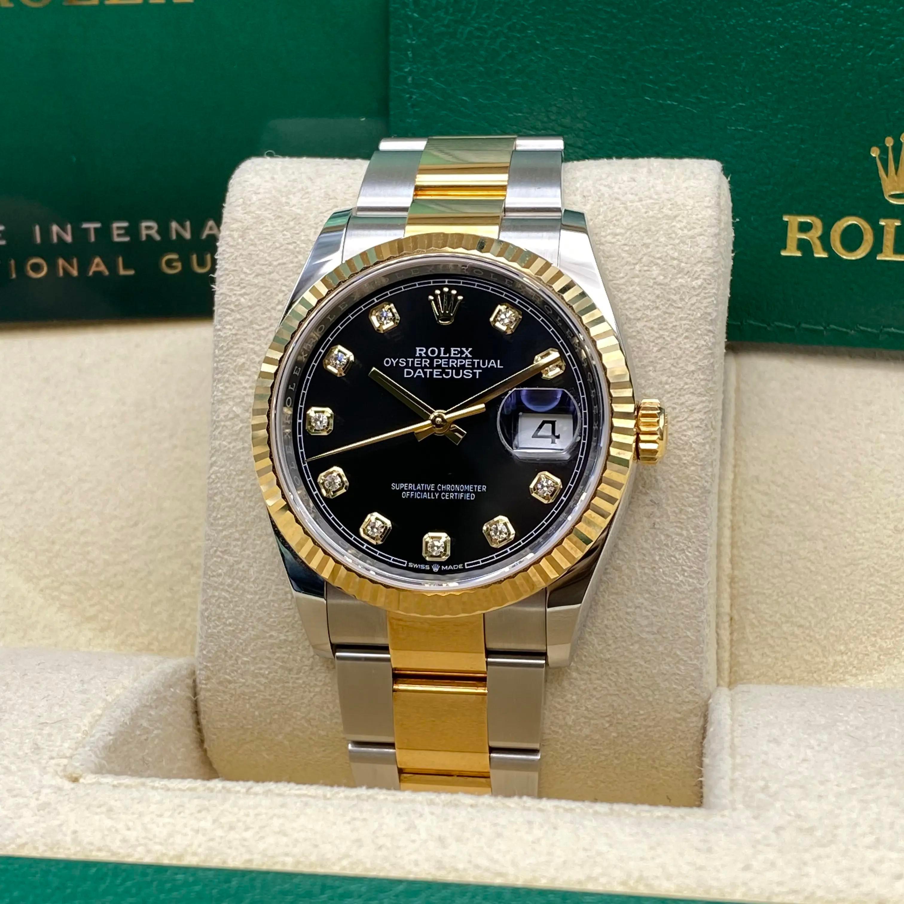 Unworn. Comes with an original box and papers.