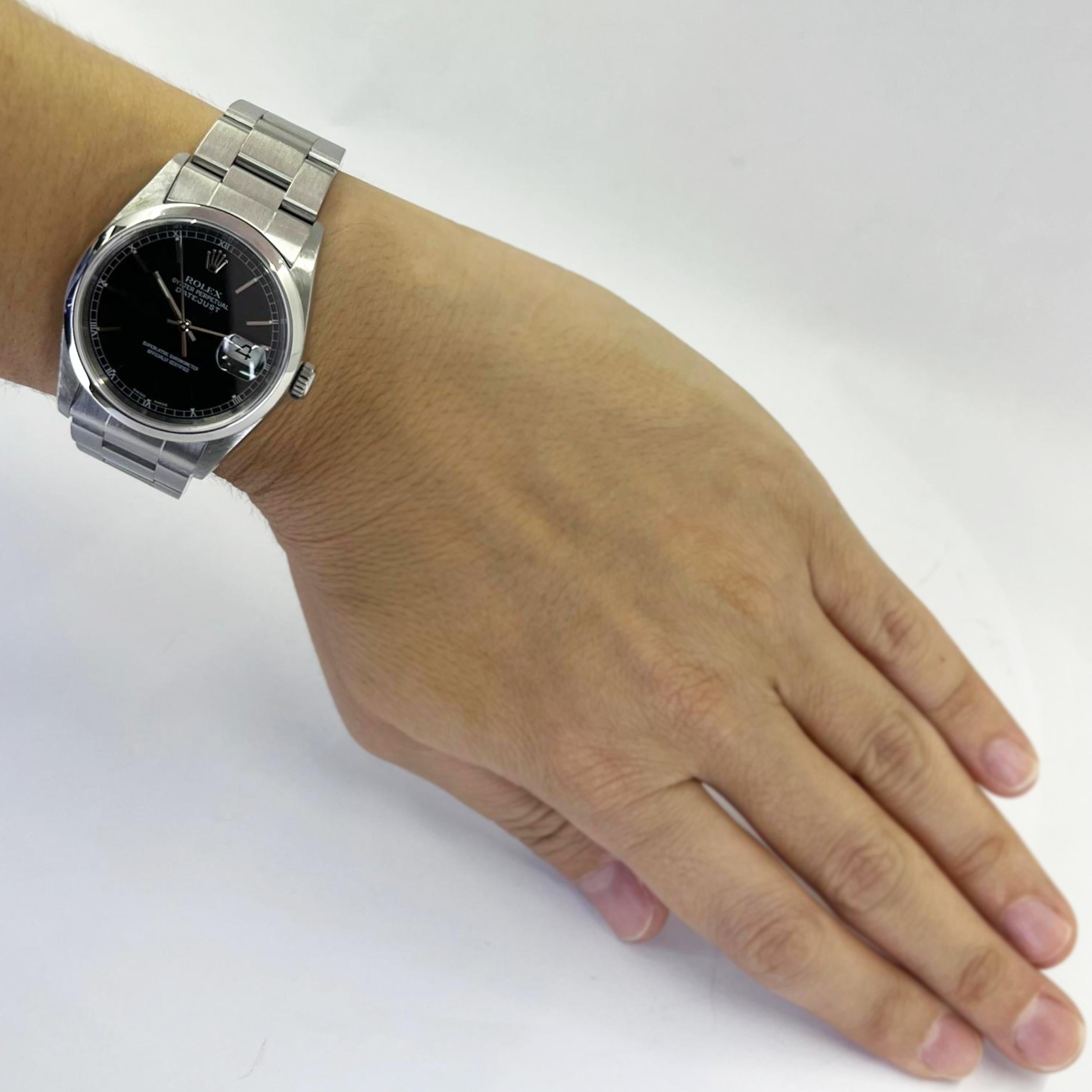 Pre-Owned Rolex 36mm Stainless Steel Datejust Featuring A Black Stick Dial & Polished Bezel On Oyster Bracelet. Model 16200, K Serial Number circa 2000. Polished and Serviced August 2024 by CW21 Watchmaker with New Rolex Parts. Includes 1 year