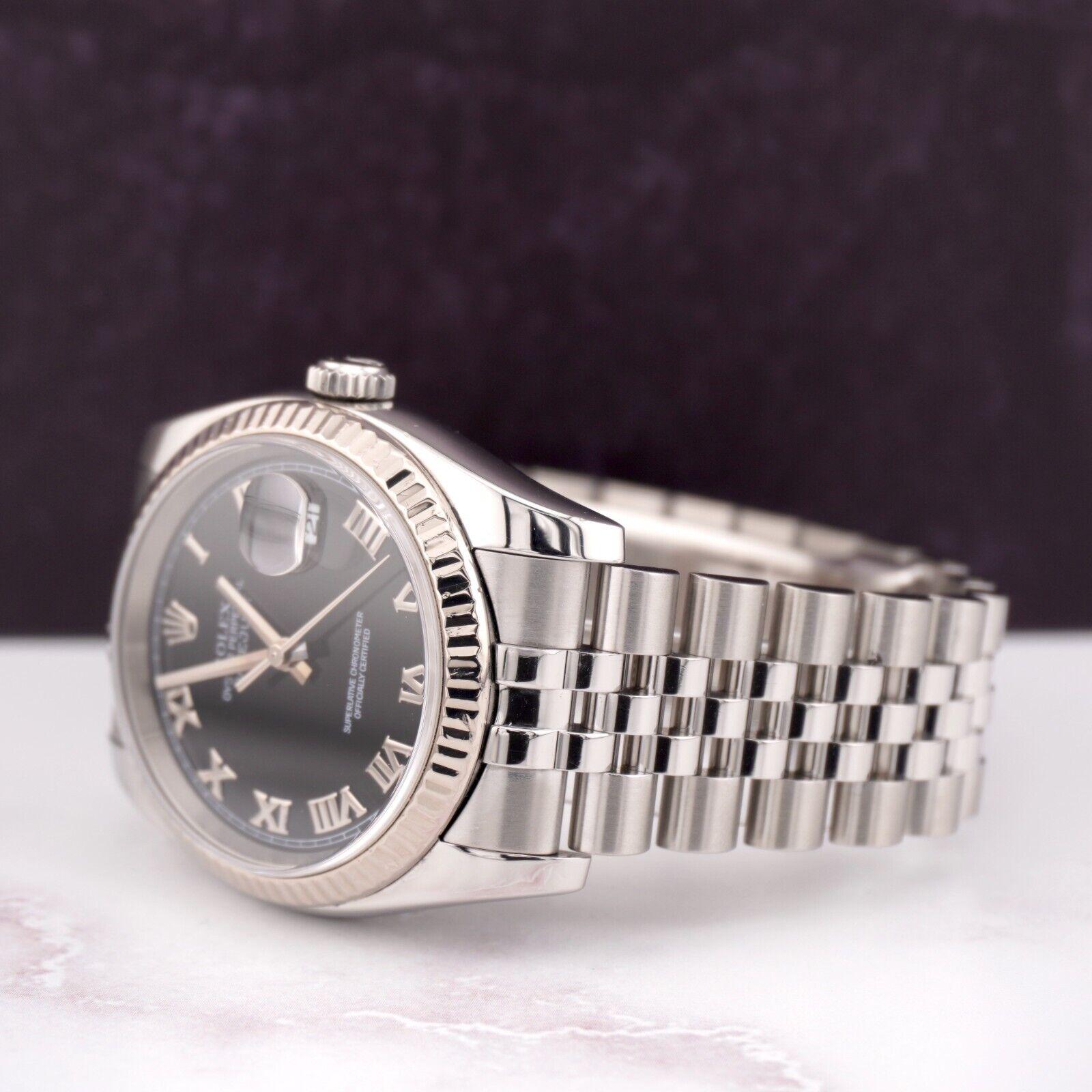 Rolex Datejust 36mm Watch. A Pre-owned watch w/ Original Box and 2006 Papers. Watch is 100% Authentic and Comes with Authenticity Card. Watch Reference is 116234 and is in Excellent Condition (See Pictures). The dial color is Black and material is