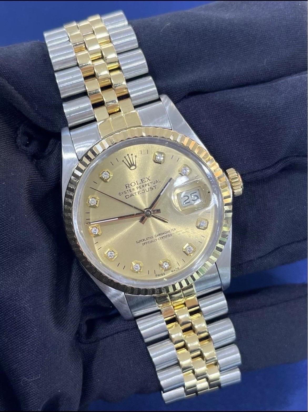 The Rolex Datejust 36mm Champagne Dial 18K Gold Stainless Steel Jubilee Watch (Ref. 16013) is a timeless symbol of elegance and craftsmanship. Featuring a stunning champagne-colored dial, this watch exudes sophistication and versatility, making it